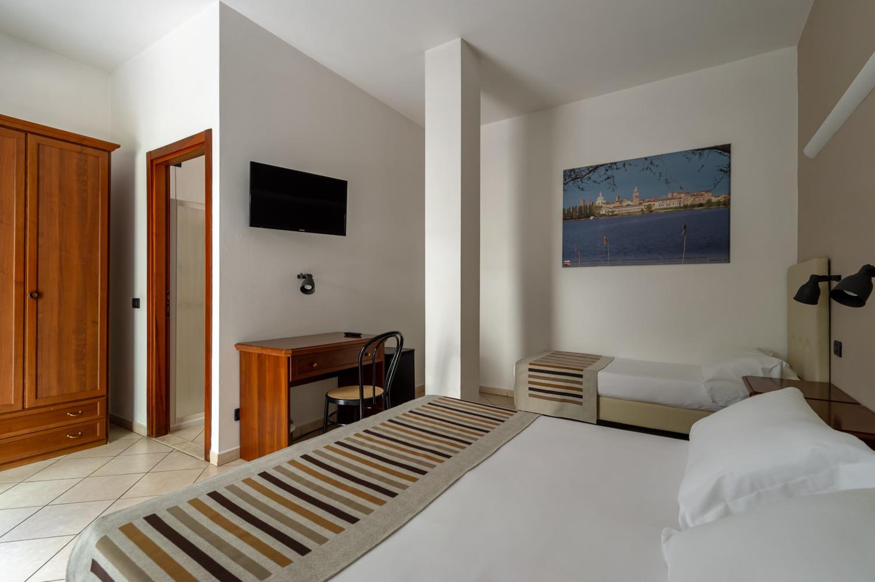 Triple Room - Photo 1
