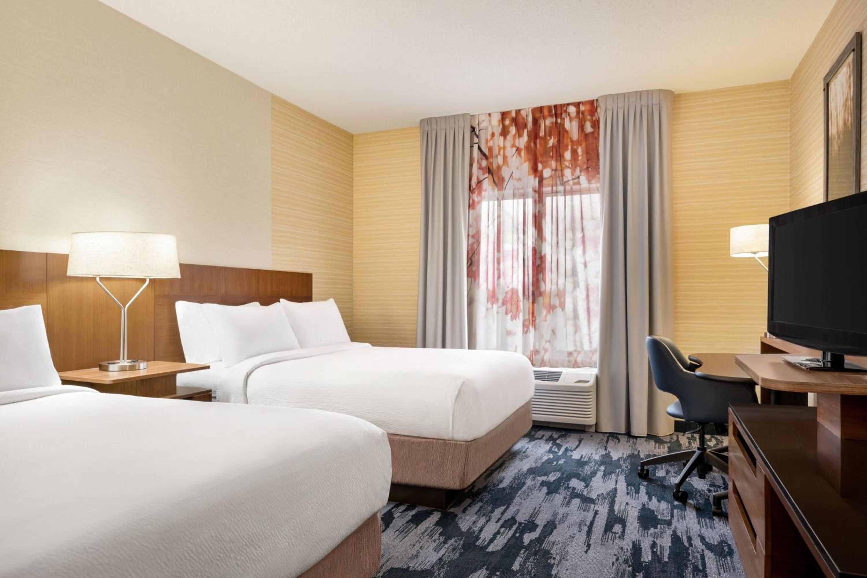 Queen Room with Two Queen Beds - Hearing Accessible photo 1