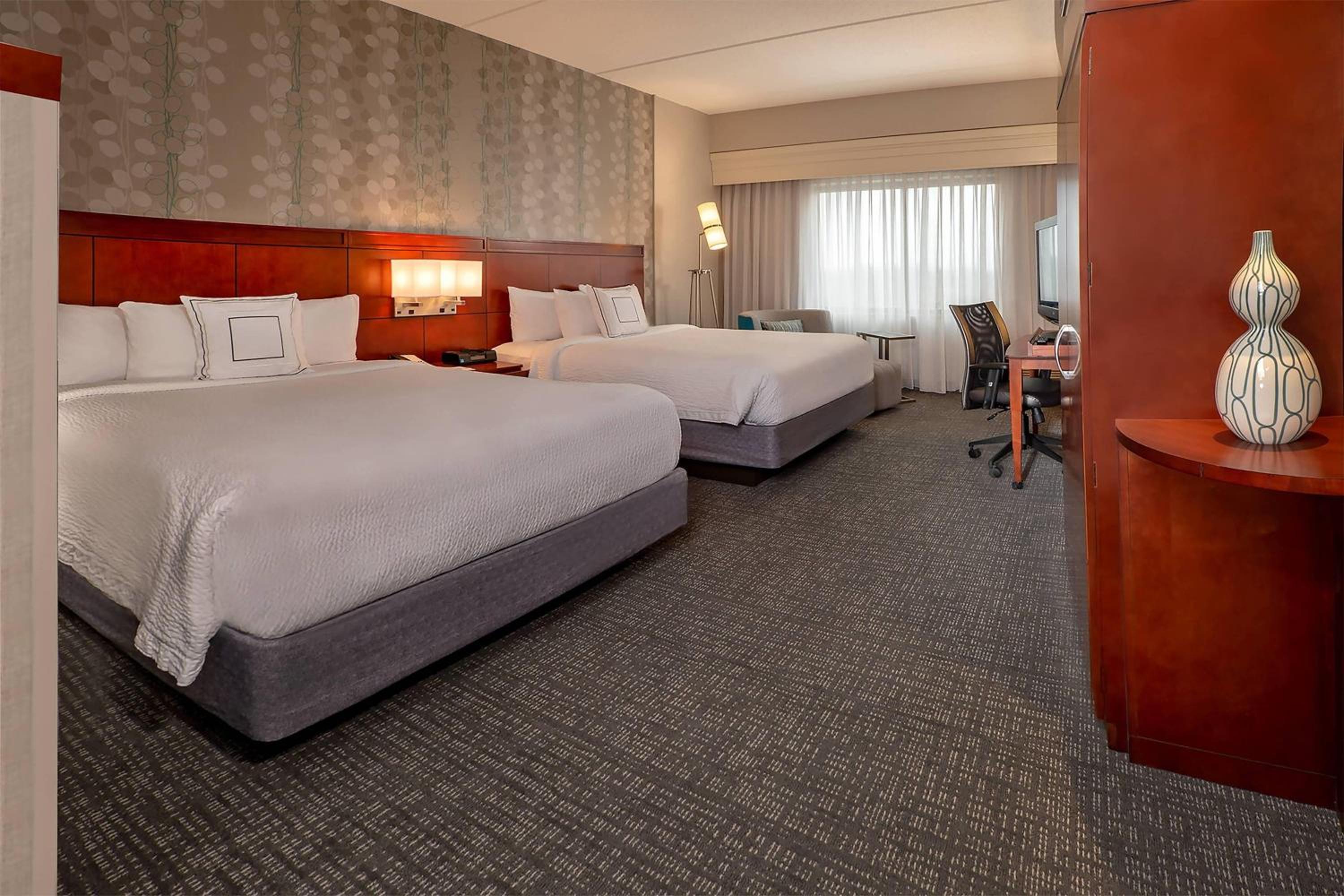 Queen Room with Two Queen Beds - Photo 1