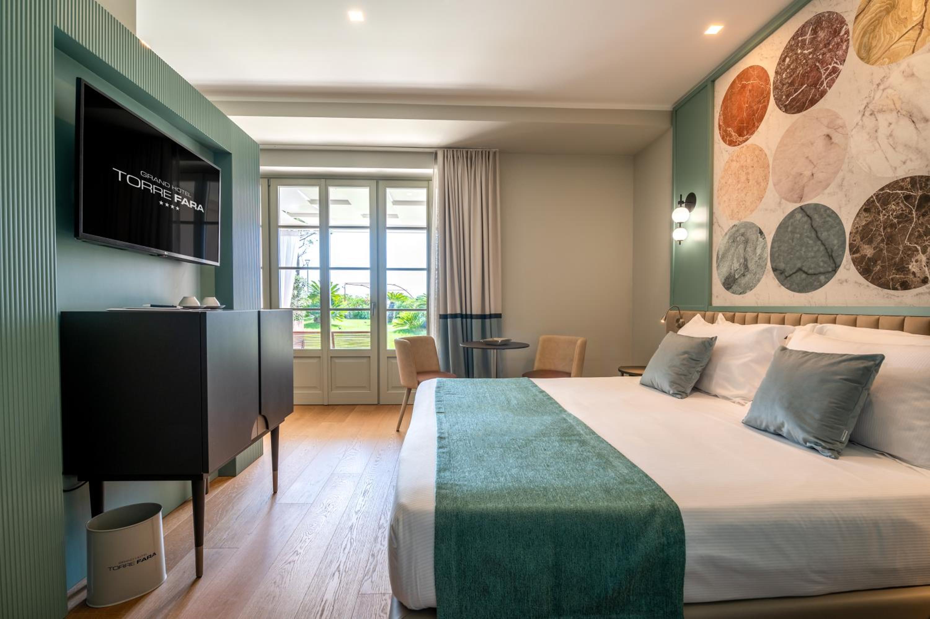 Deluxe Double Room with Patio and Side Sea View - Photo 1