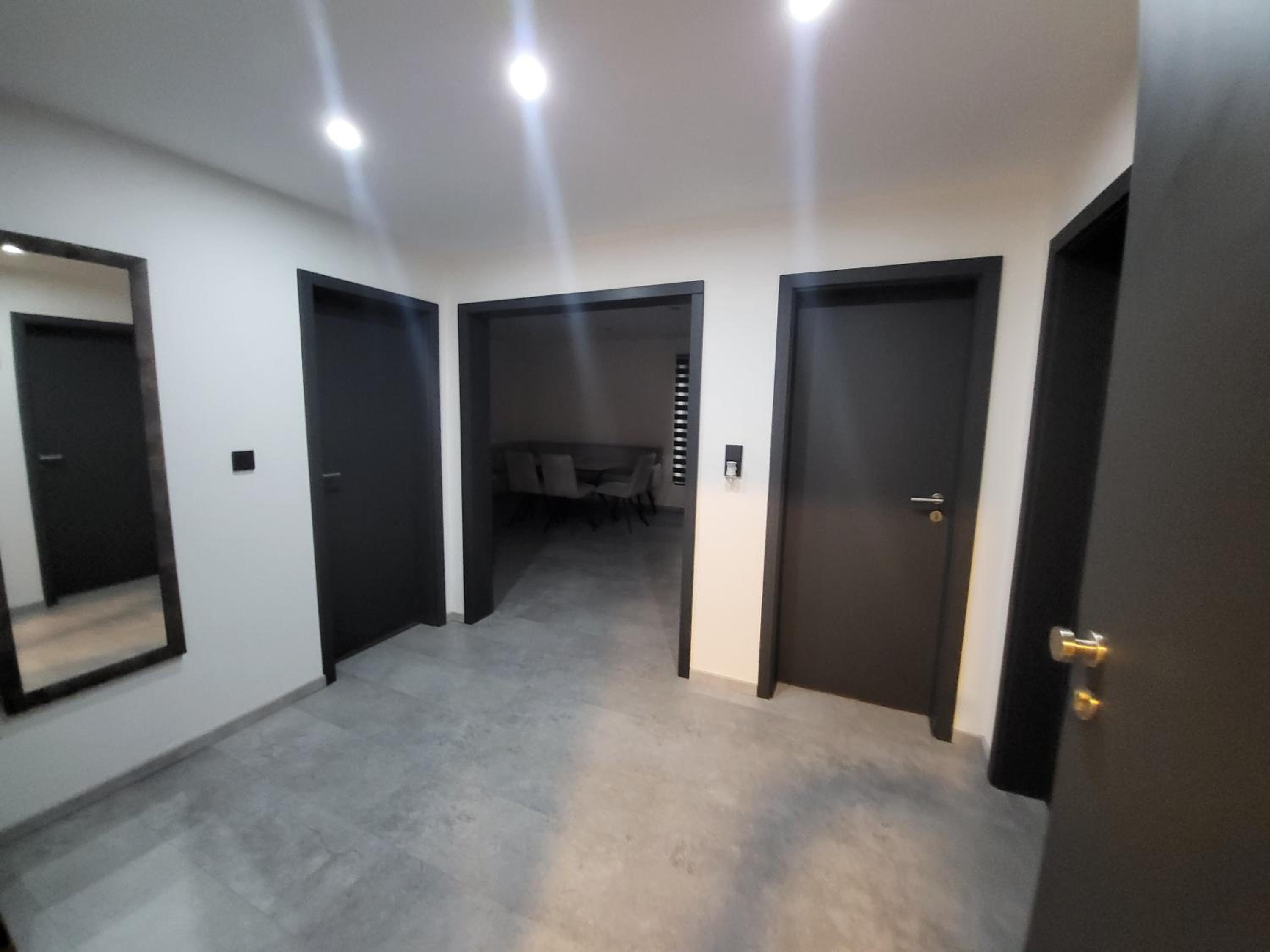 Three-Bedroom Apartment photo 1