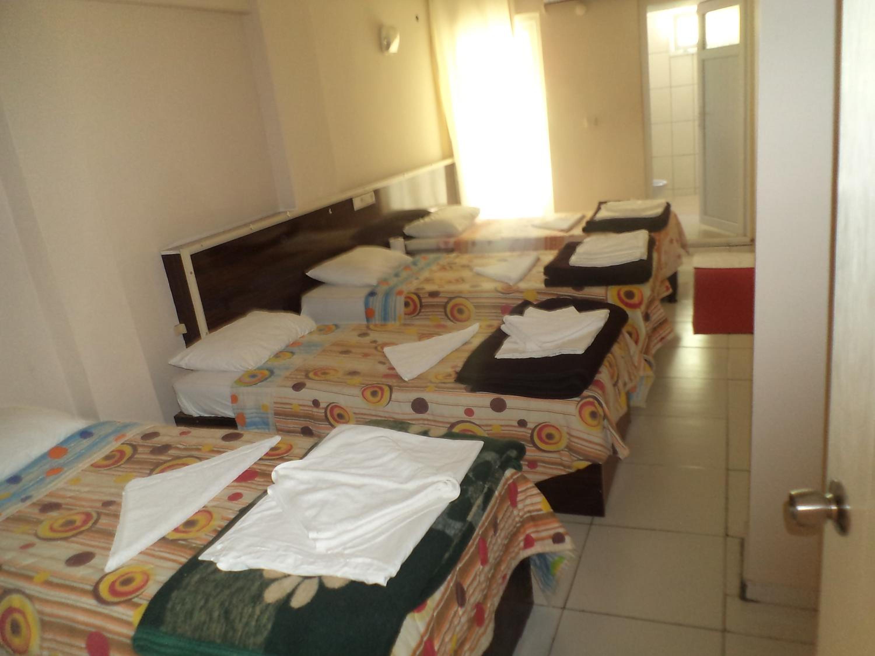 Single Bed in Dormitory Room