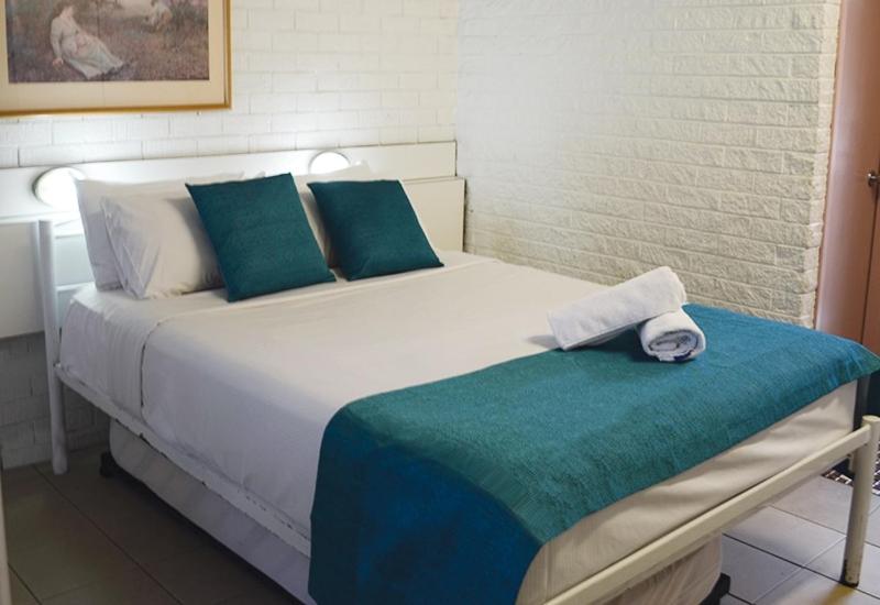 Standard Family Room with Queen Bed and Three Single Beds photo 1