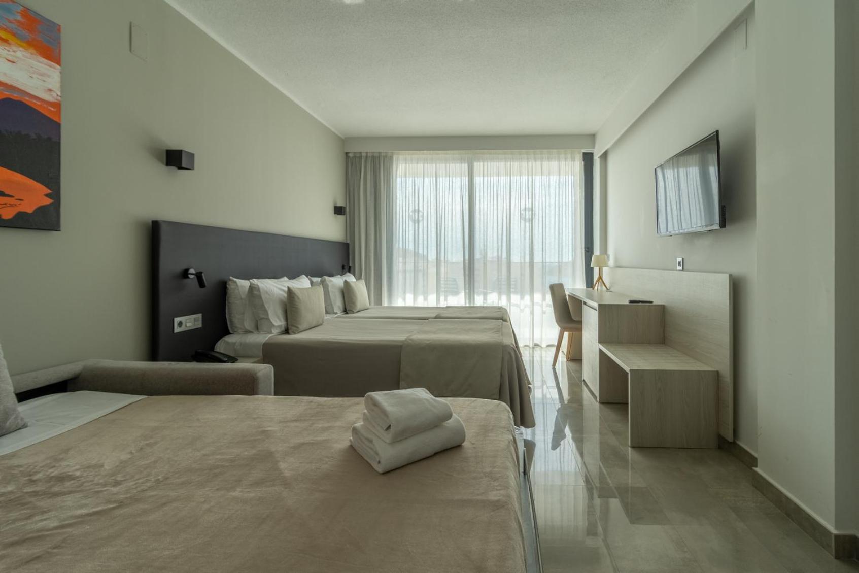 Deluxe Triple Room with Pool View (2 Adults + 1 child)