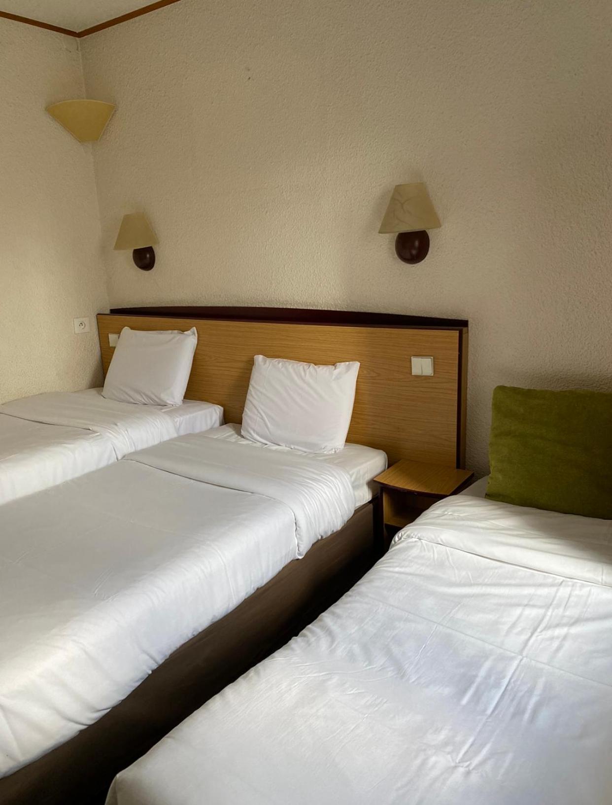 Room With 2 Single Beds And 1 Junior Bed photo 3