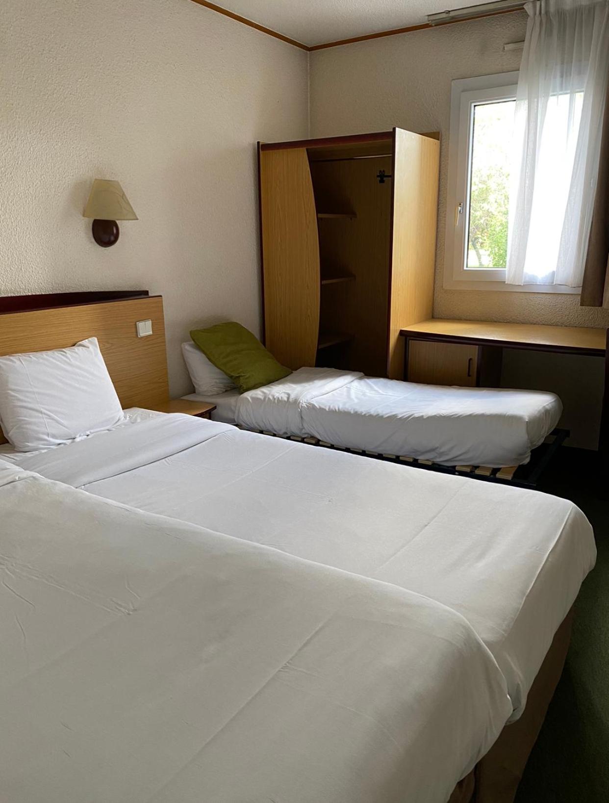Room With 2 Single Beds And 1 Junior Bed photo 2