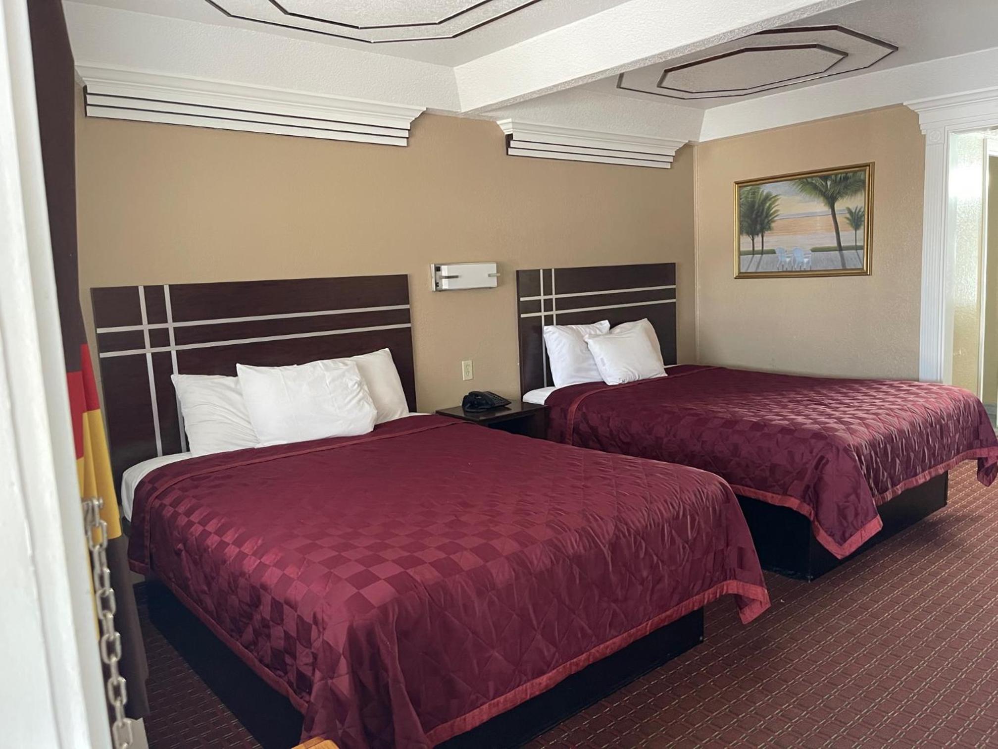Queen Room with Two Queen Beds - Photo 1