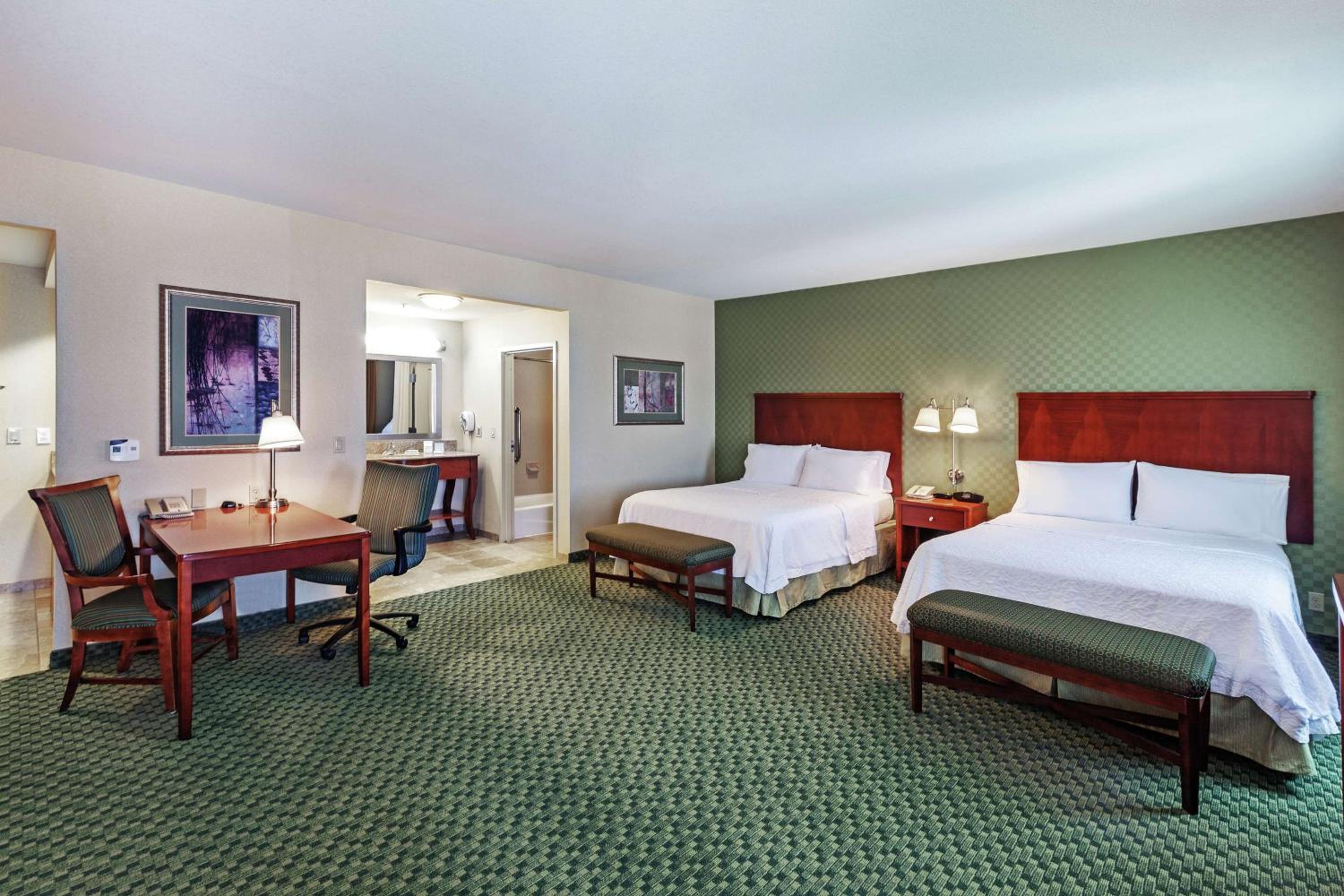 Queen Studio Suite with Two Queen Beds and Sofa Bed - Non-Smoking - Photo 1