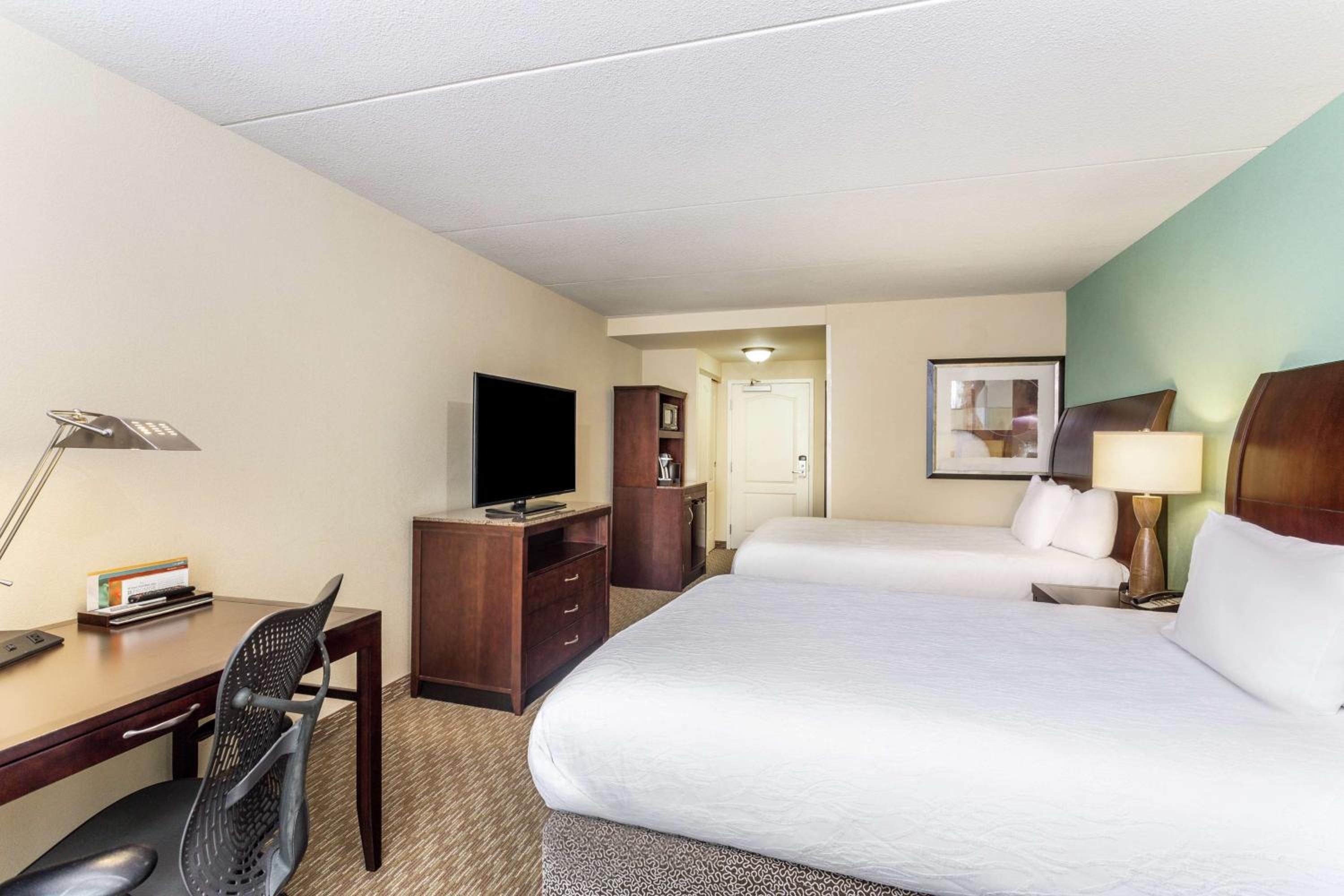 Queen Room with Two Queen Beds - Photo 1