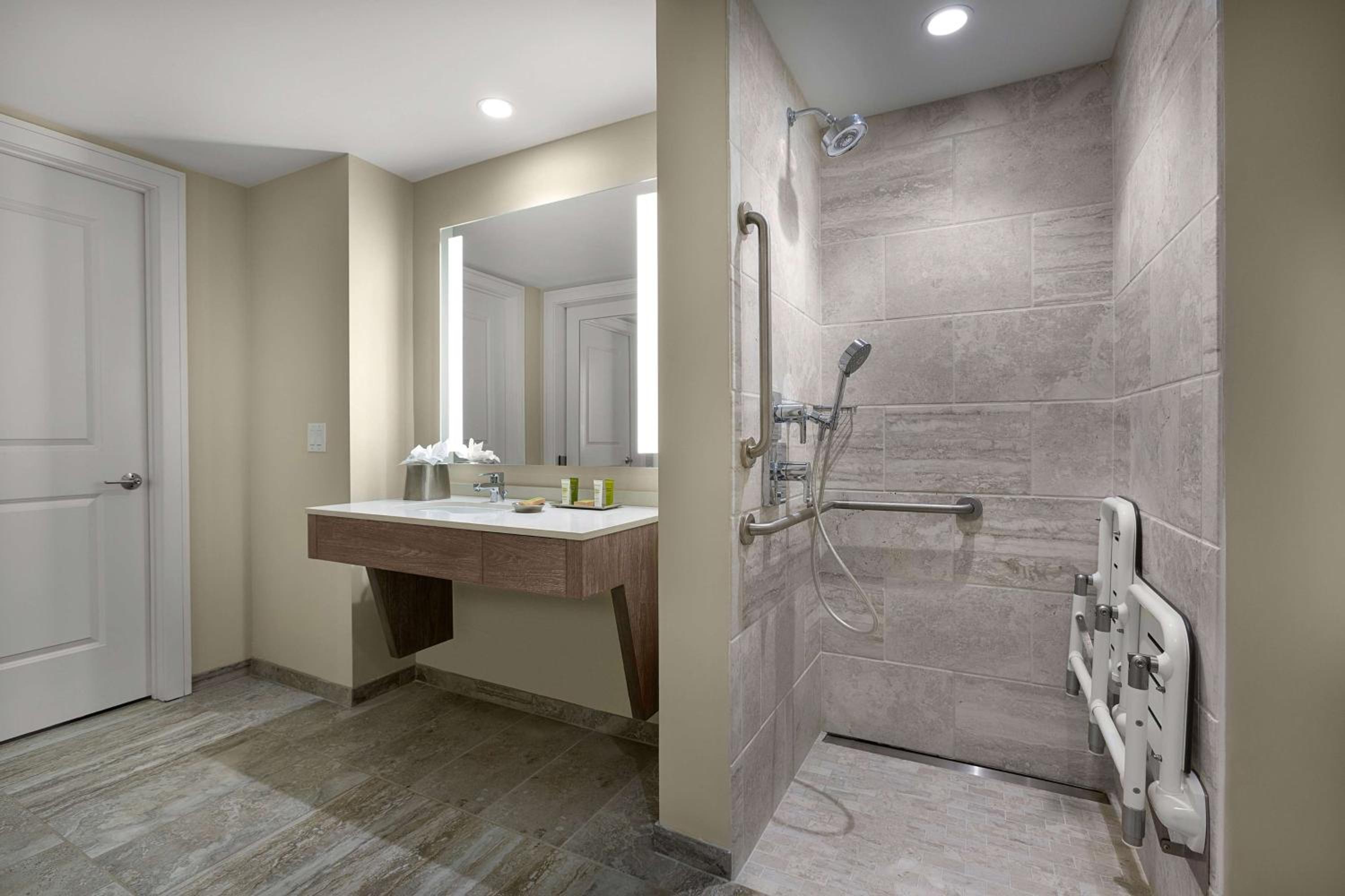 Two-Bedroom Suite with One King Bed and Two Double Beds, Roll-in Shower – Mobility Accessible