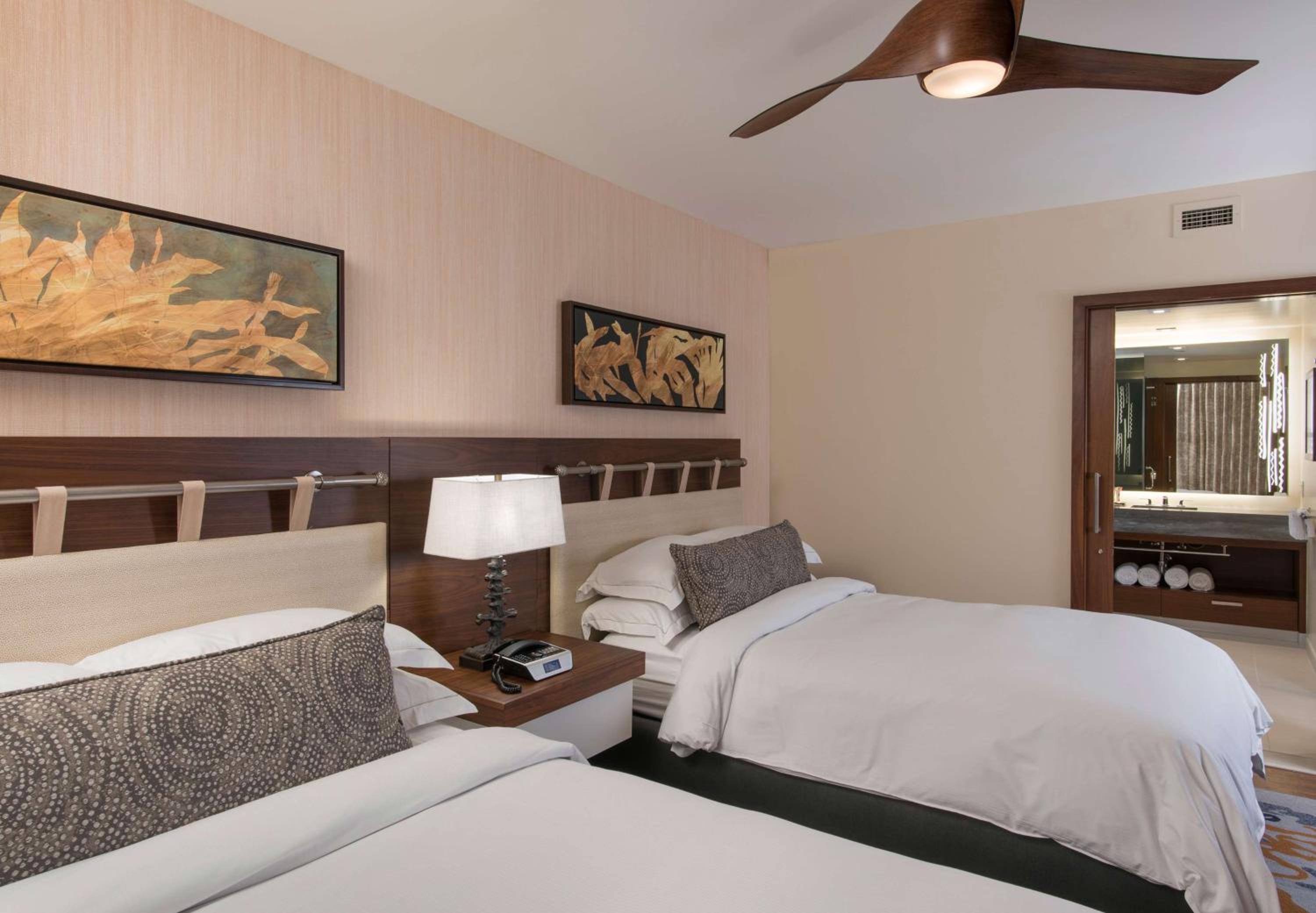 One-Bedroom Suite with Two Double Beds and Partial Ocean View