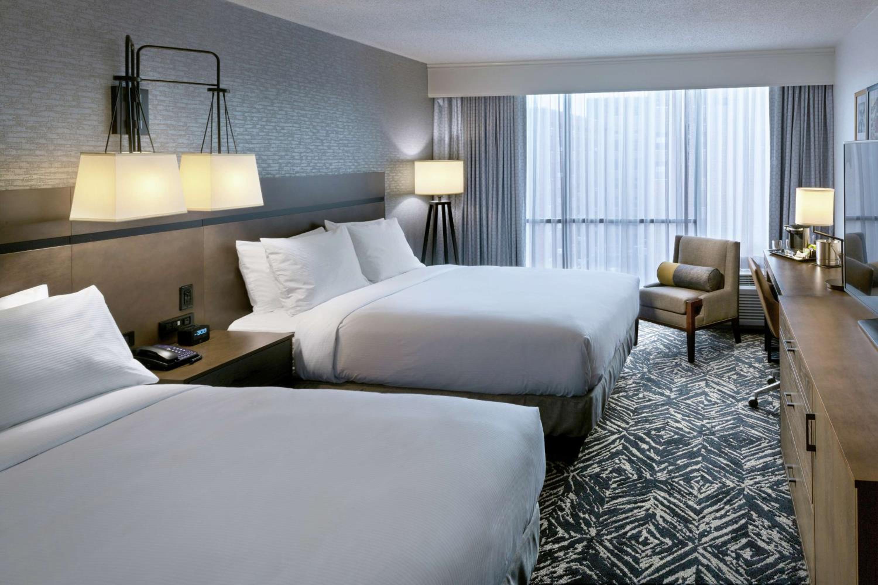 Queen Room with Two Queen Beds - Photo 2