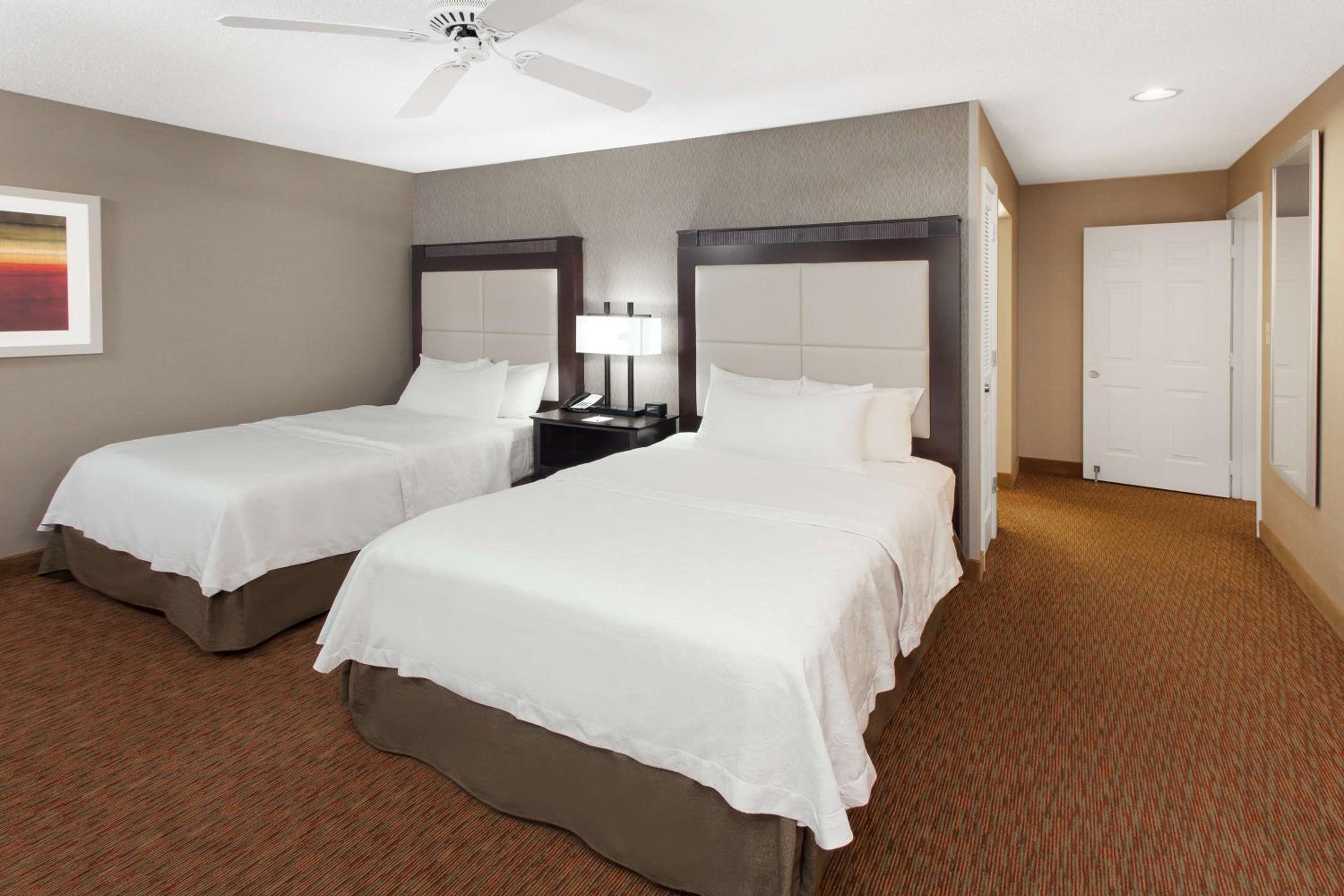 Two-Bedroom Suite with One King Bed & Two Double Beds - Photo 1