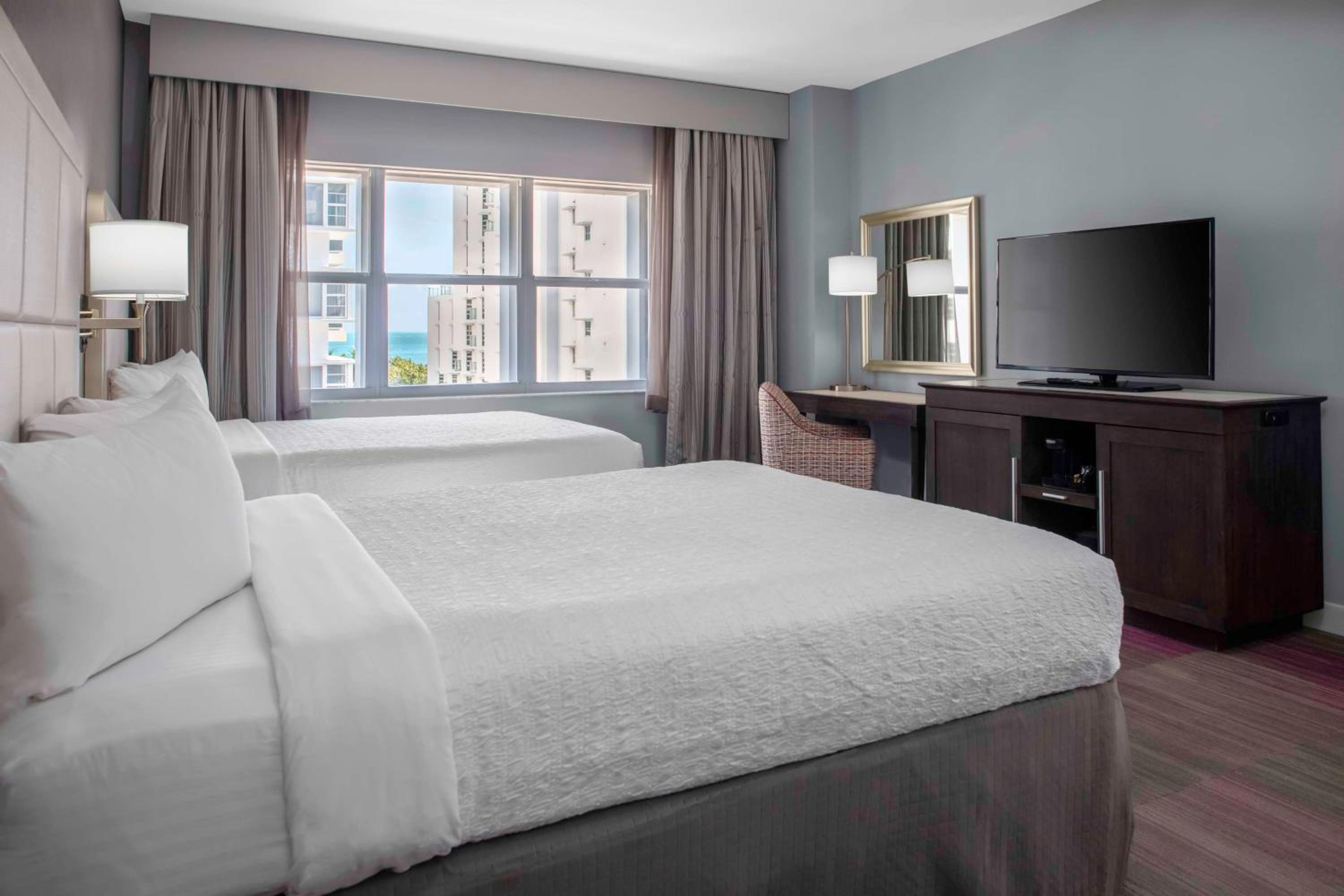 Queen Room With Two Queen Beds And Partial Ocean View