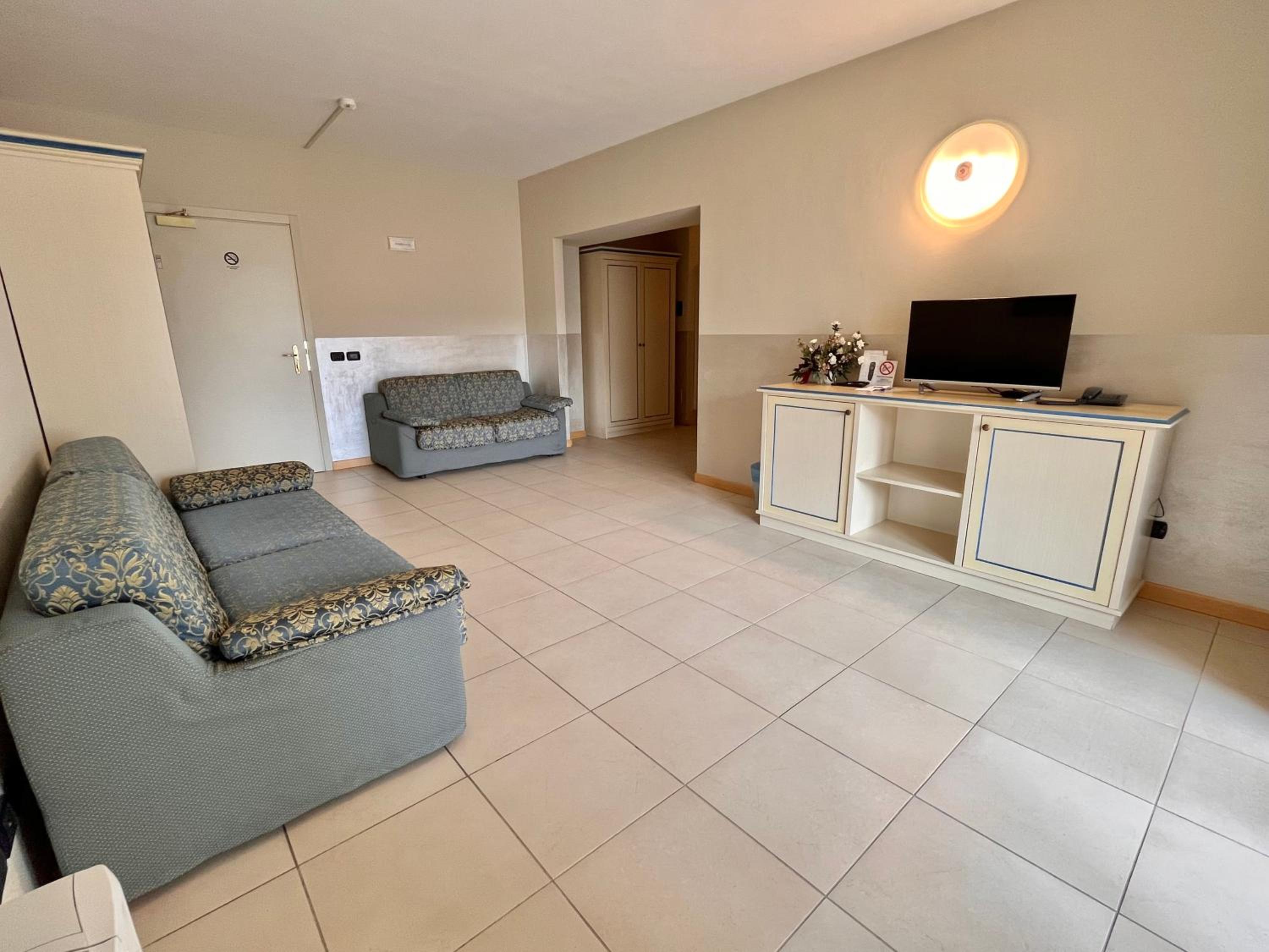 Family Room with Balcony - Photo 8