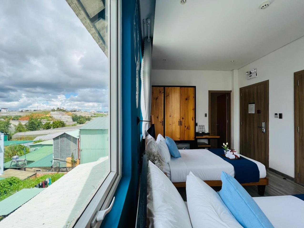 Deluxe Triple Room - Photo 9