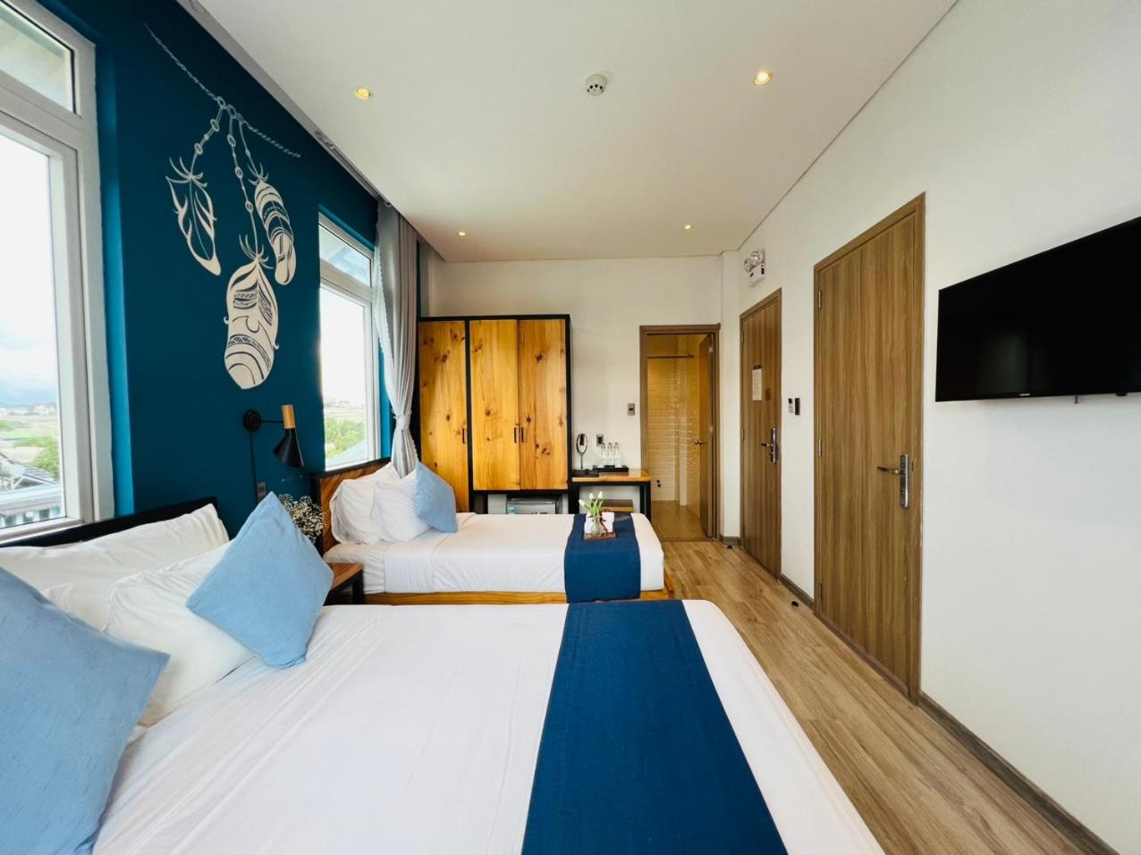 Deluxe Triple Room - Photo 10