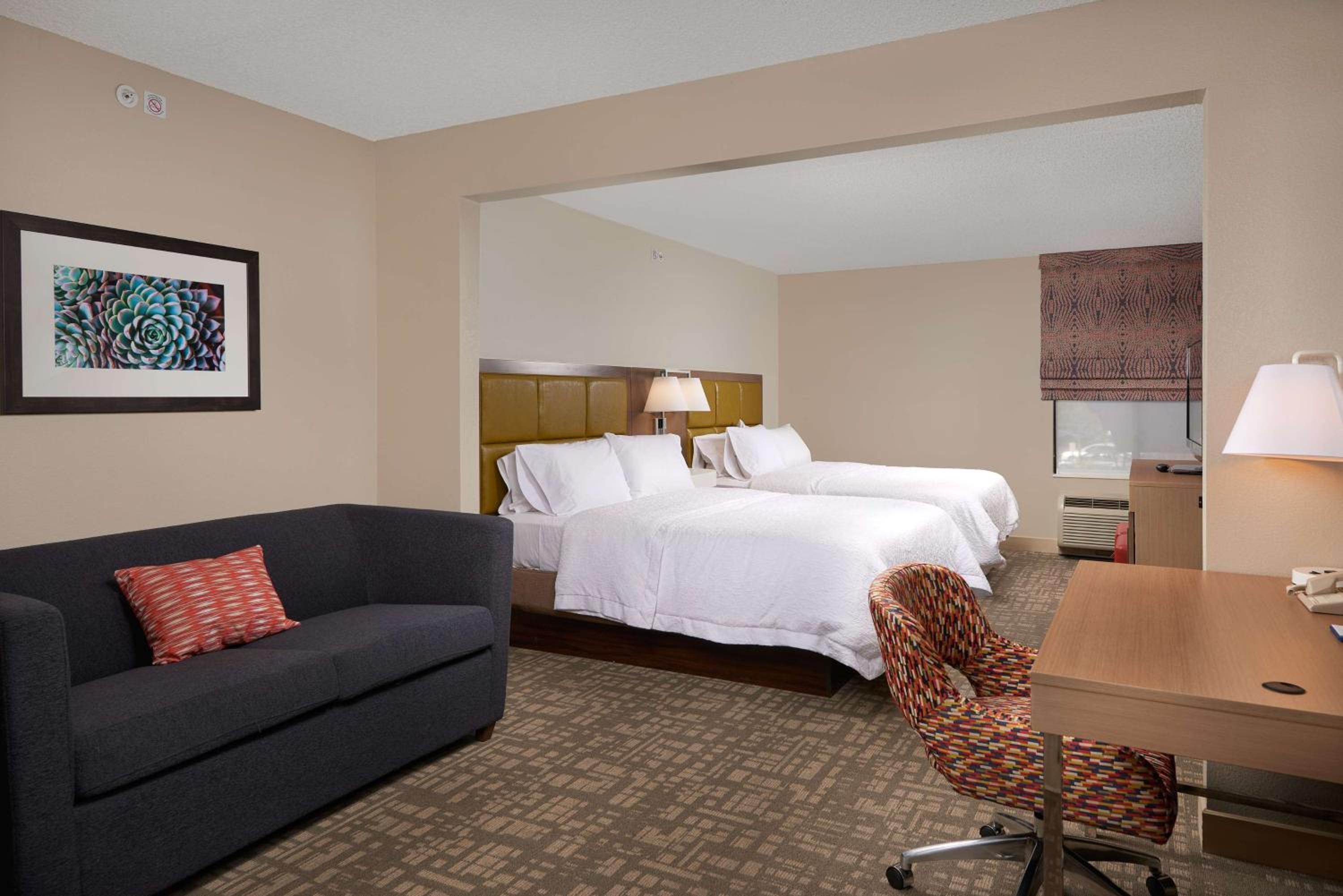 Queen Room with Two Queen Beds - Photo 1