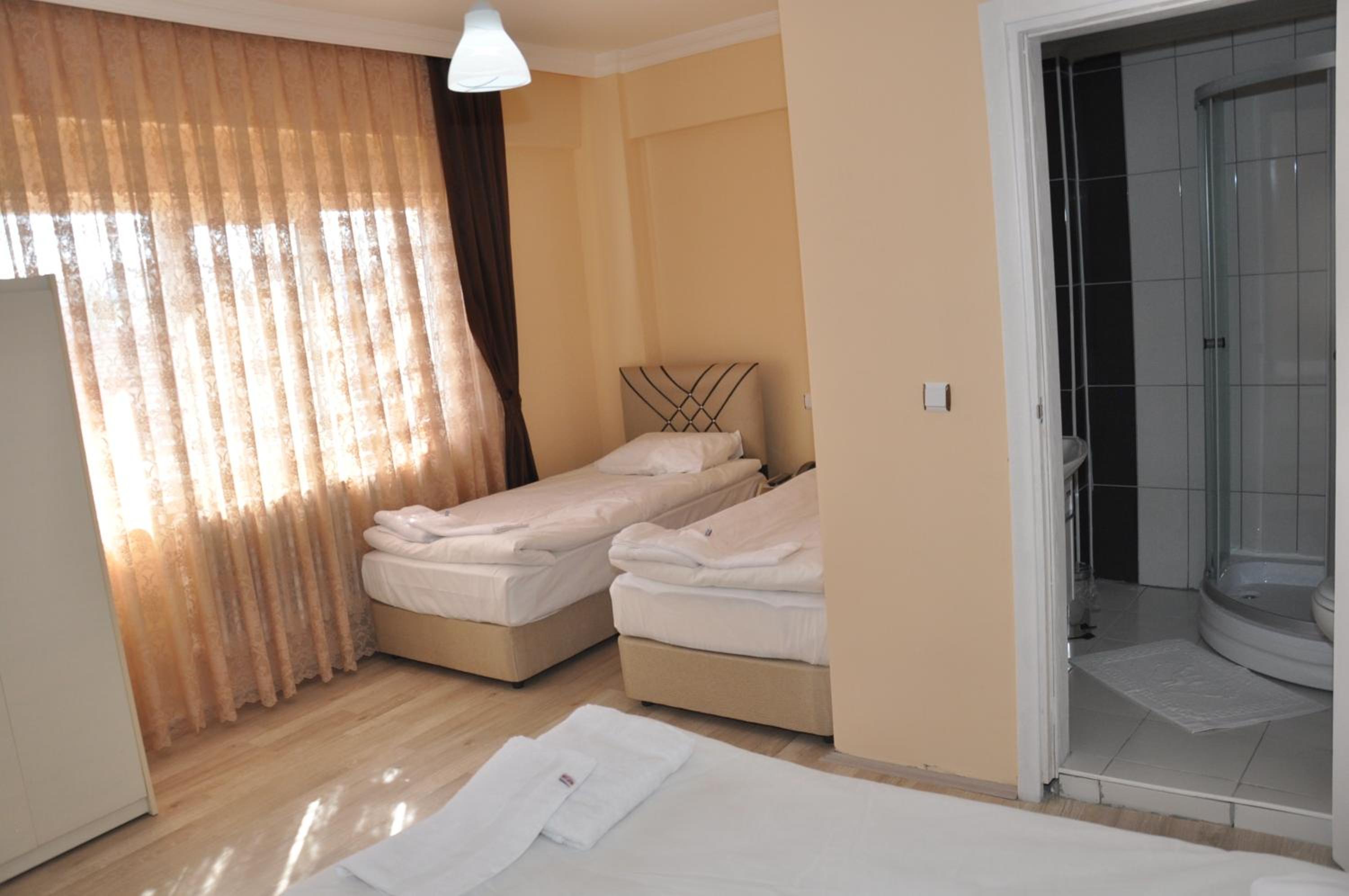 Standard Quadruple Room - Photo 4