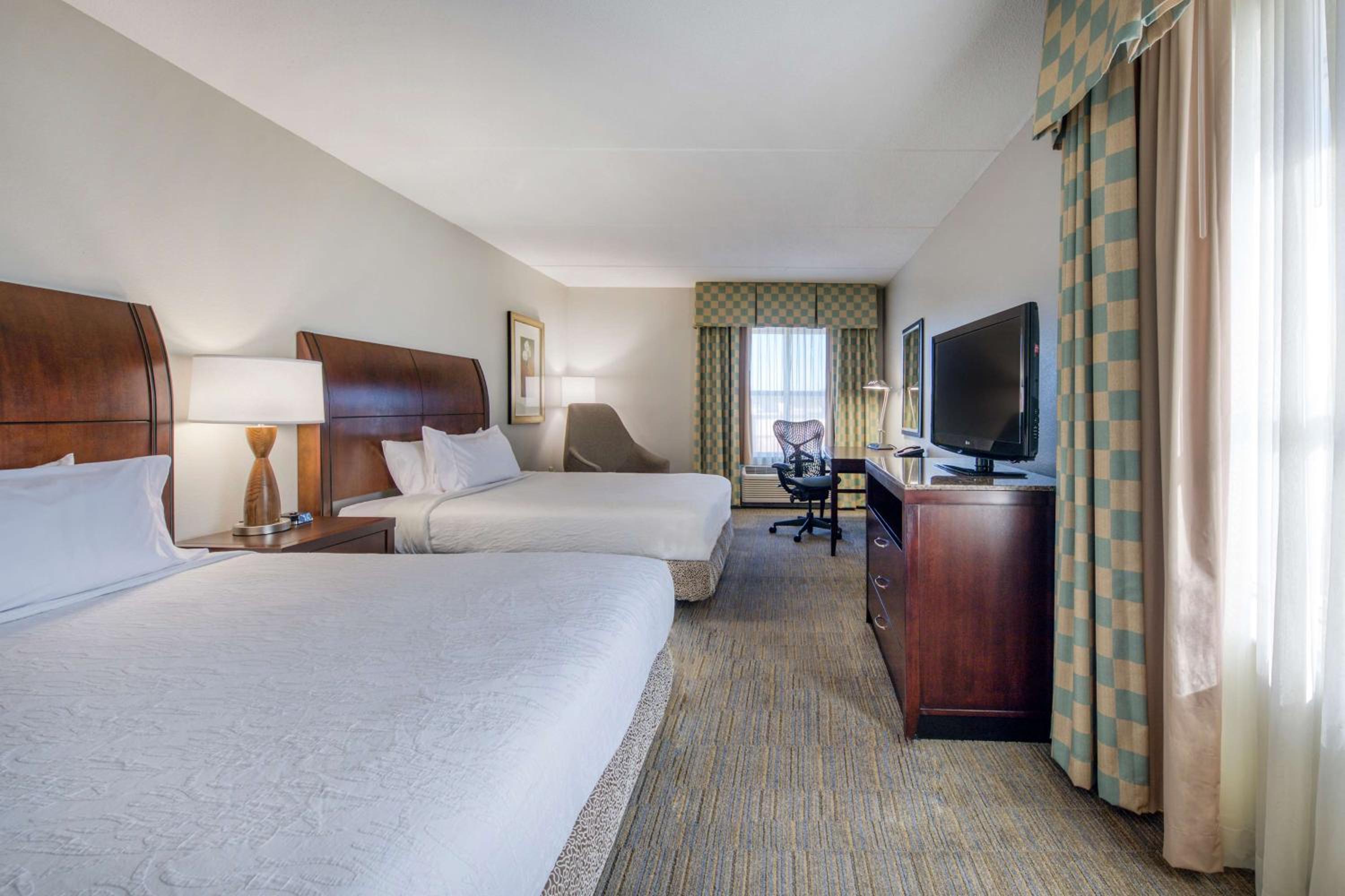 Corner Queen Room with Two Queen Beds - Photo 1