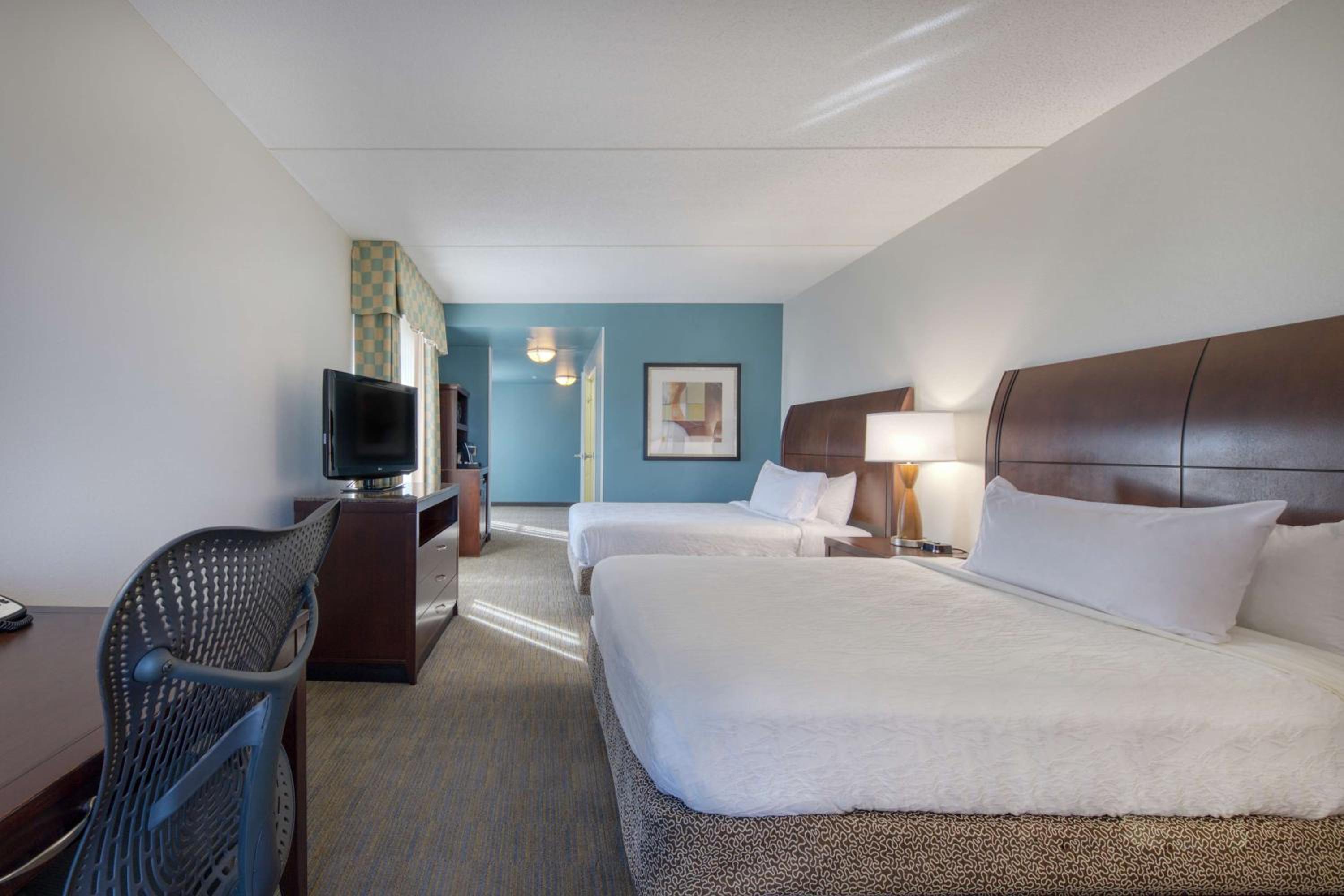 Corner Queen Room with Two Queen Beds - Photo 2