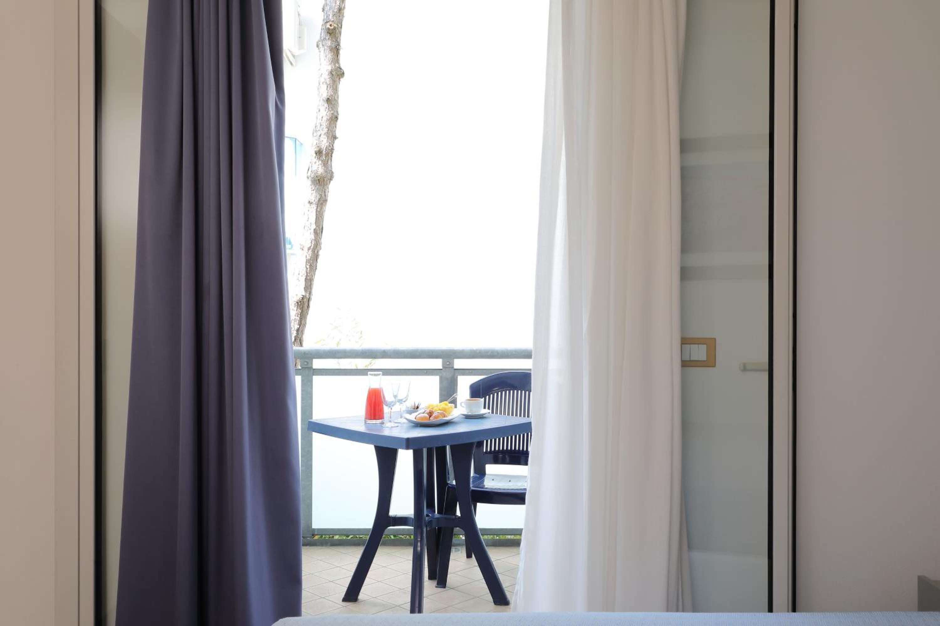 Family Room with Balcony - Photo 2
