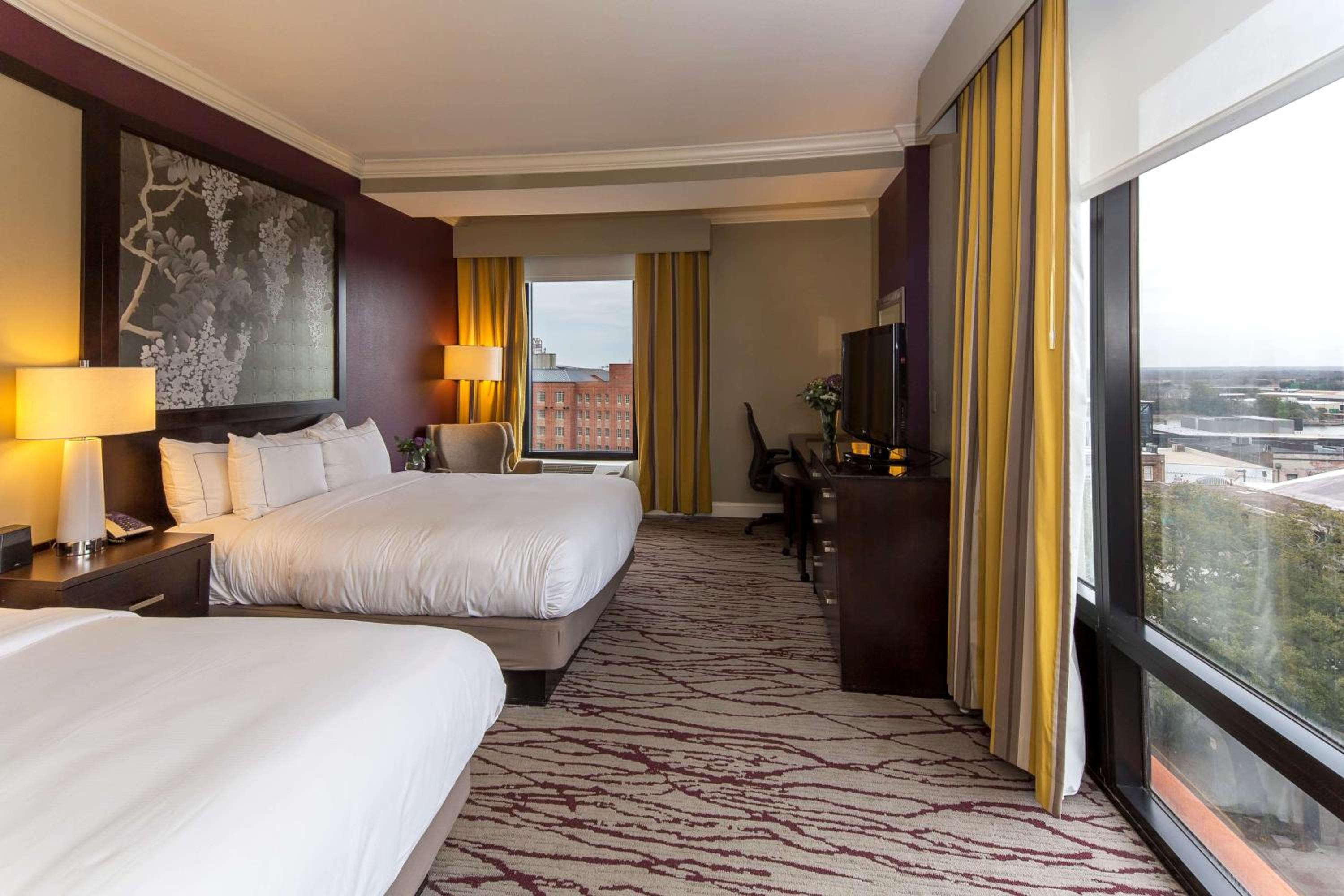 Corner Queen Room with Two Queen Beds - Photo 1