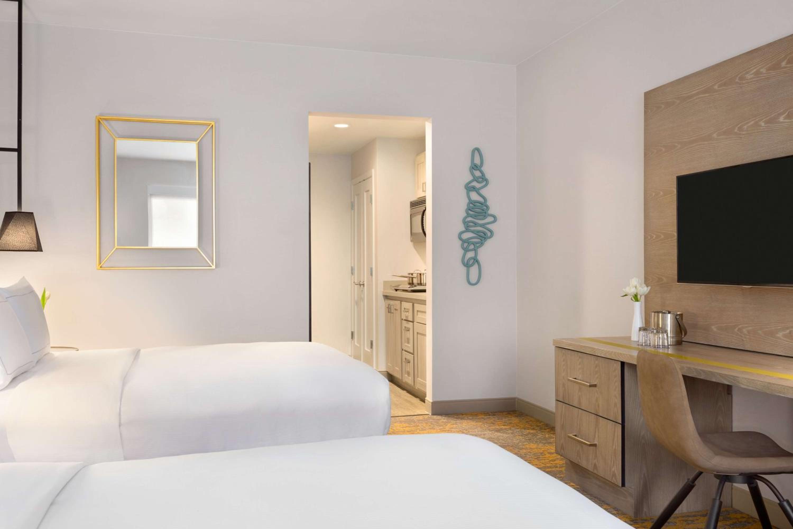 Queen Room with Two Queen Beds and Pool View - Photo 1