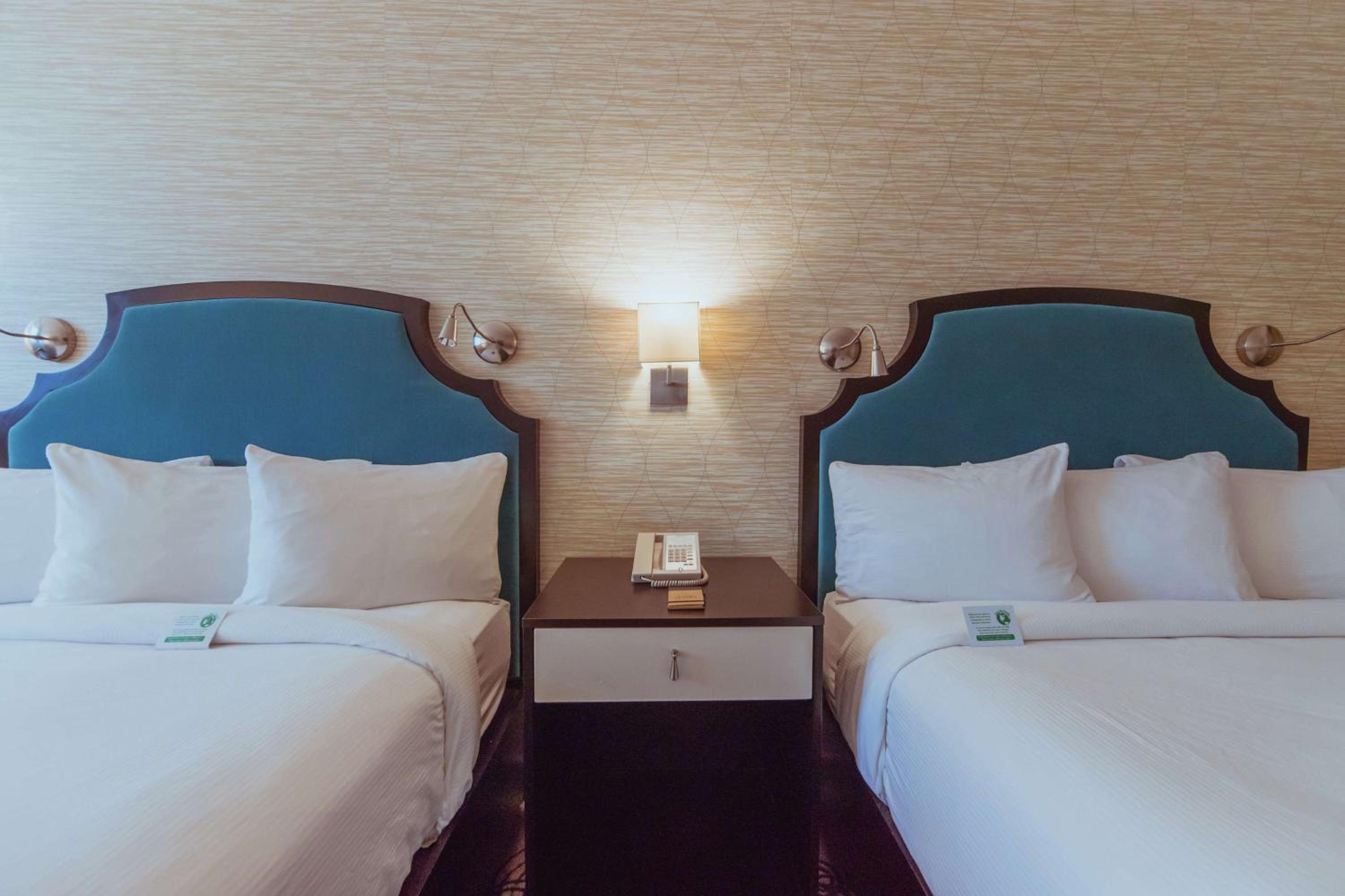 Queen Room with Two Queen Beds - Photo 2