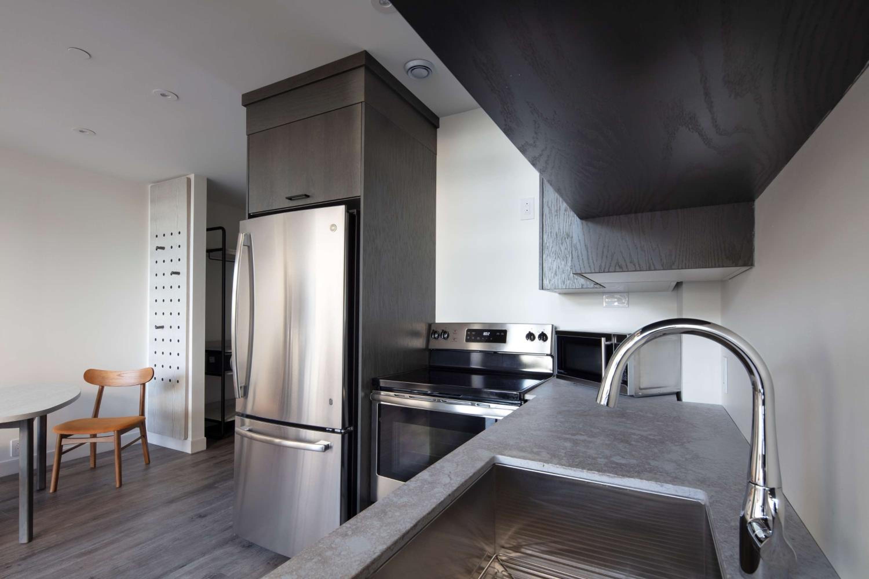 Two-Level King Suite with Balcony and Kitchen - Photo 6
