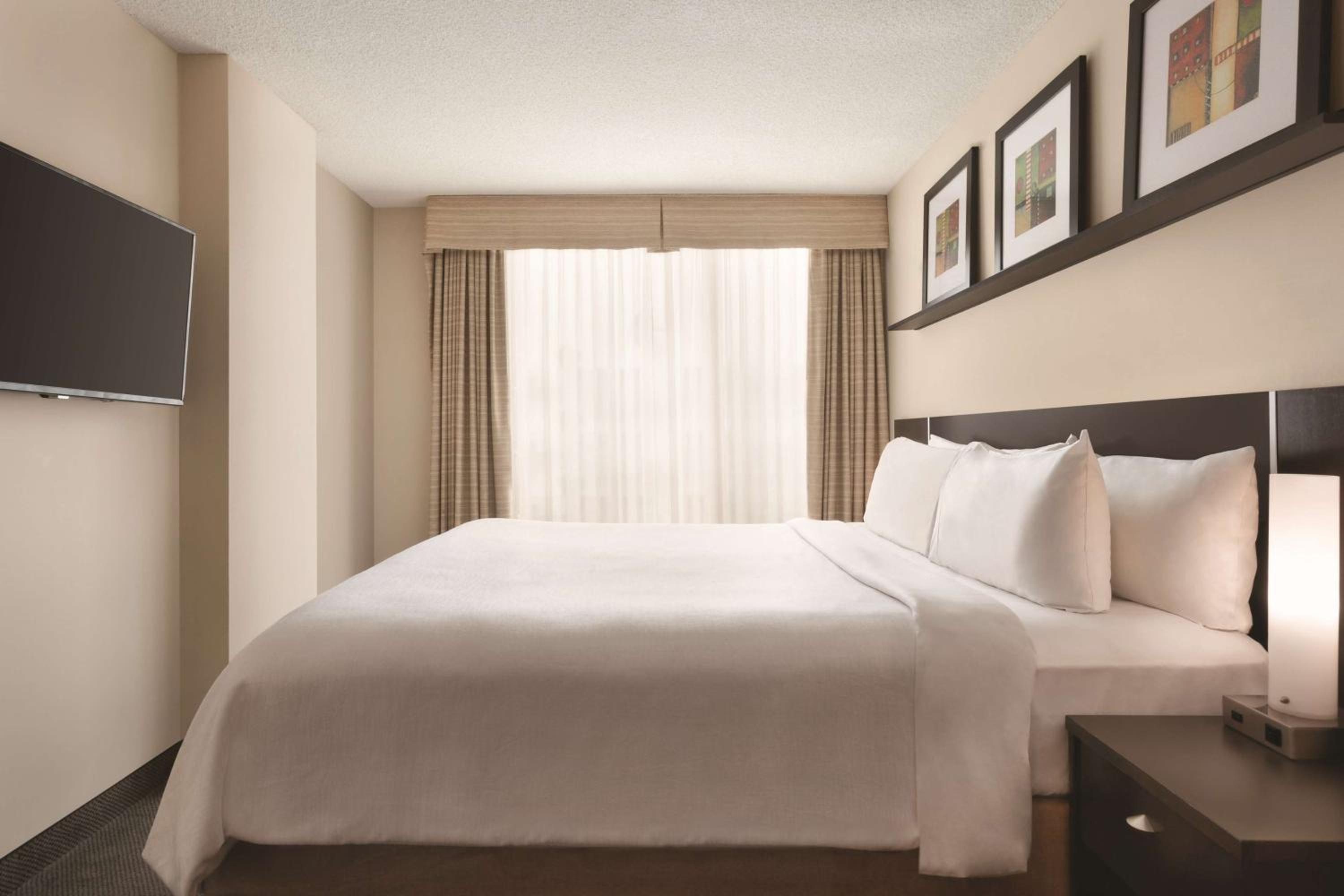 Two-Bedroom Presidential Suite with One King Bed and Two Double Beds