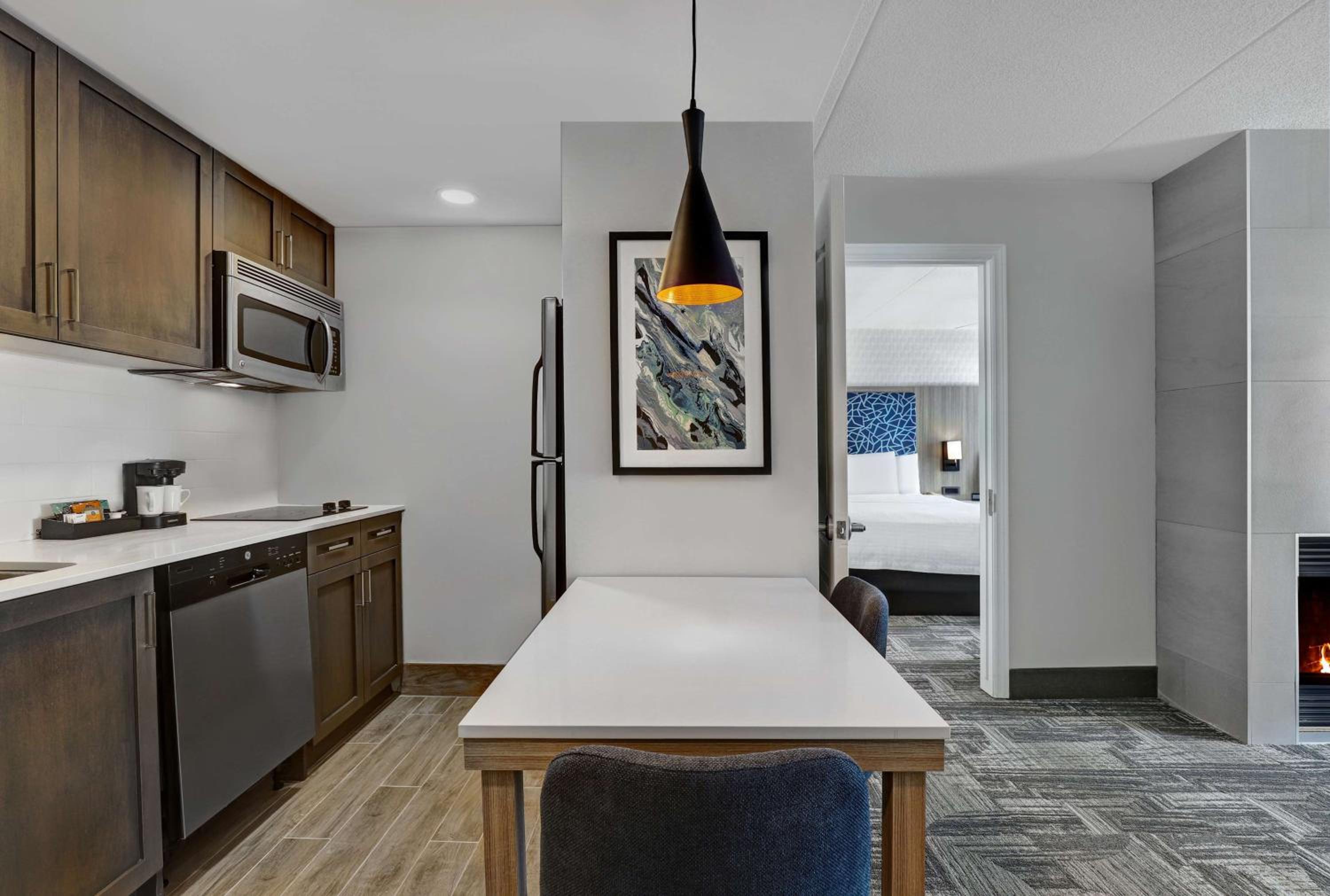 kitchen with a fireplace in the middle of the room
