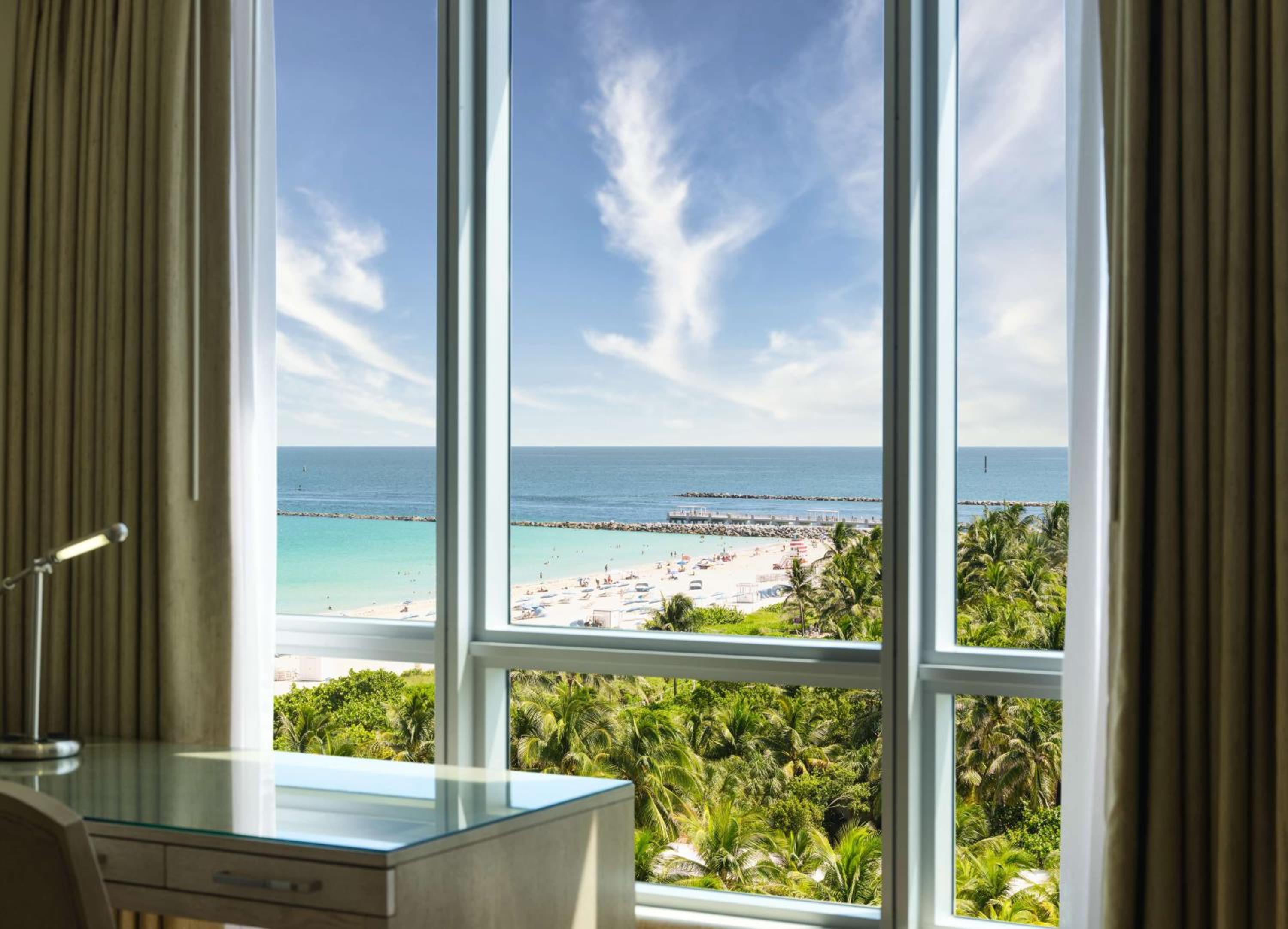 Corner Studio with Two Double Beds and Partial Ocean View