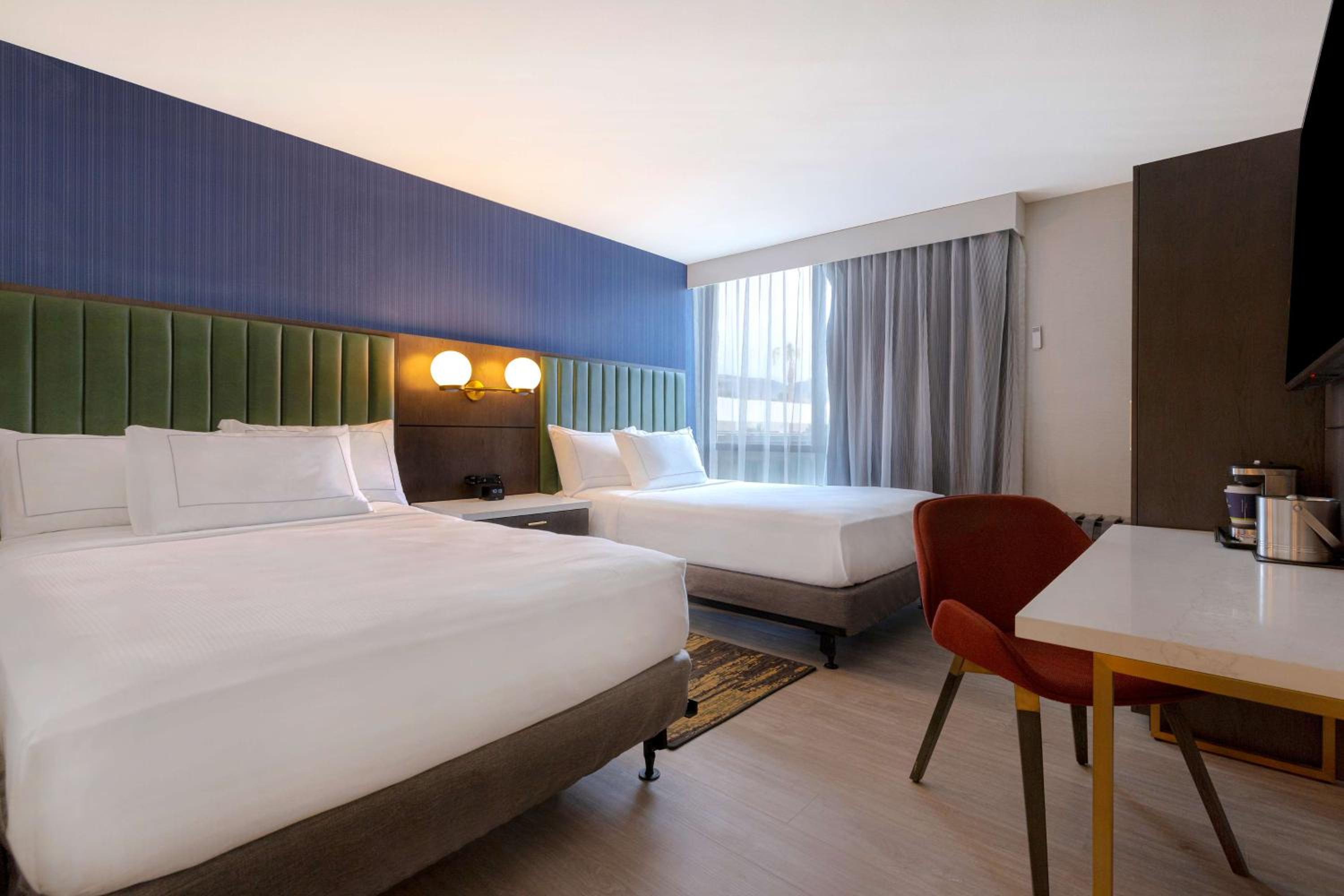 Queen Room with Two Queen Beds - Photo 9