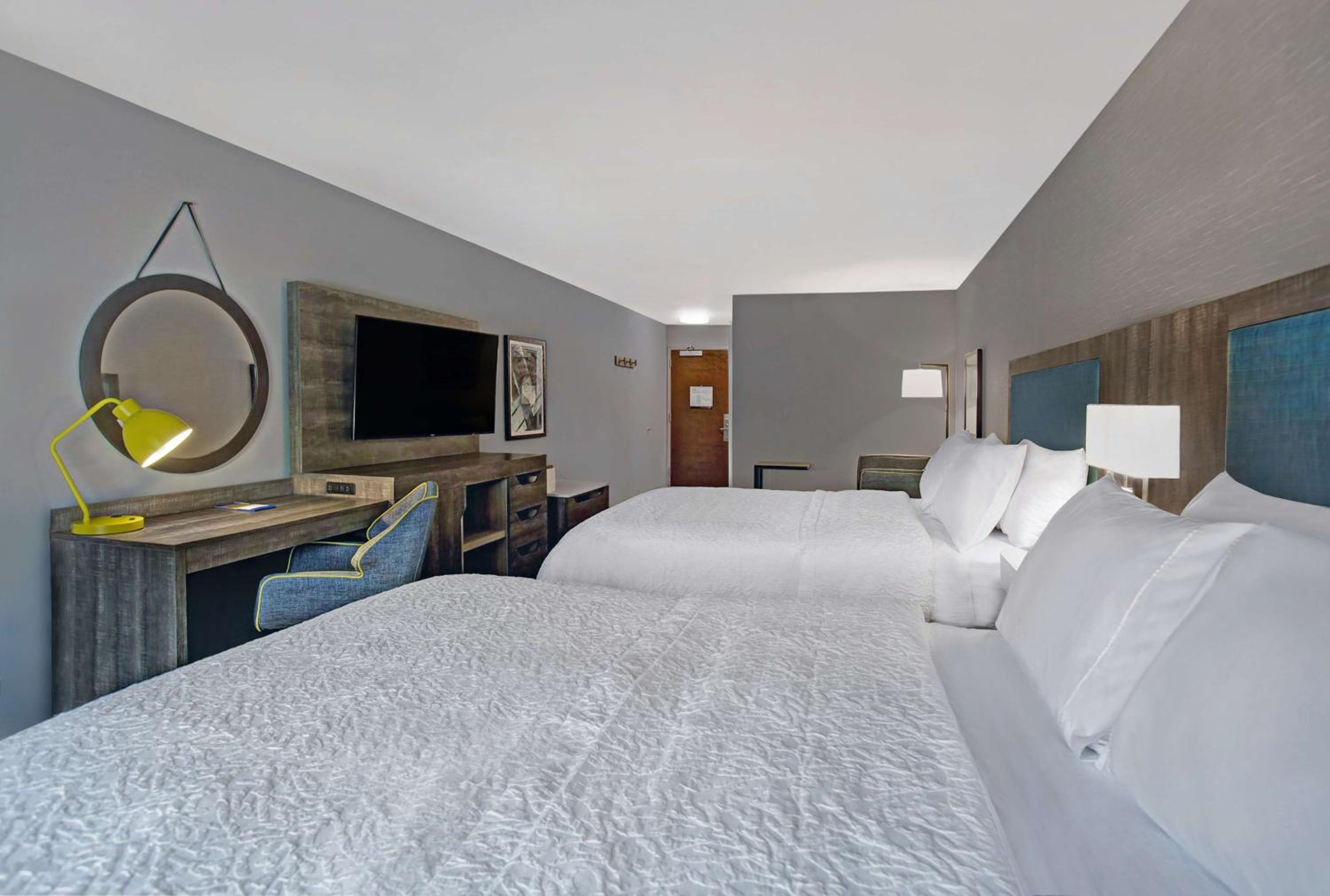 Queen Room with Two Queen Beds and Sofa Bed - Photo 1