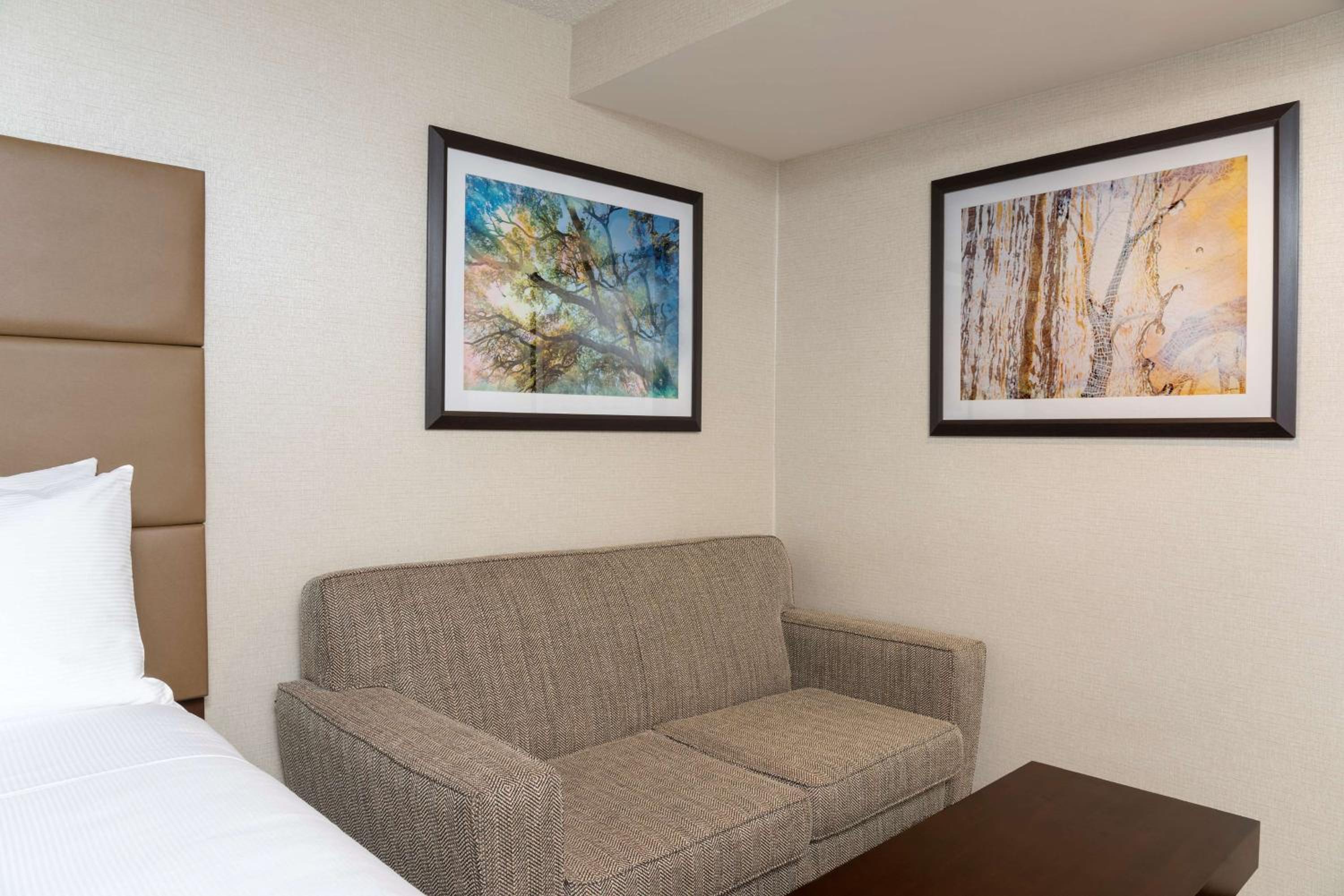 Queen Room with Two Queen Beds and Sofa Bed - Photo 3