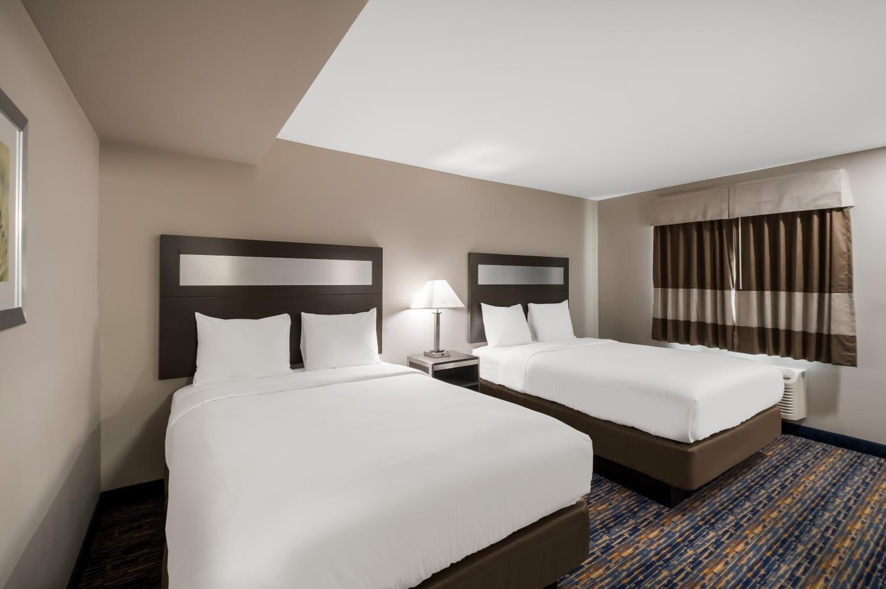 Standard Queen Room with Two Queen Beds - Photo 1