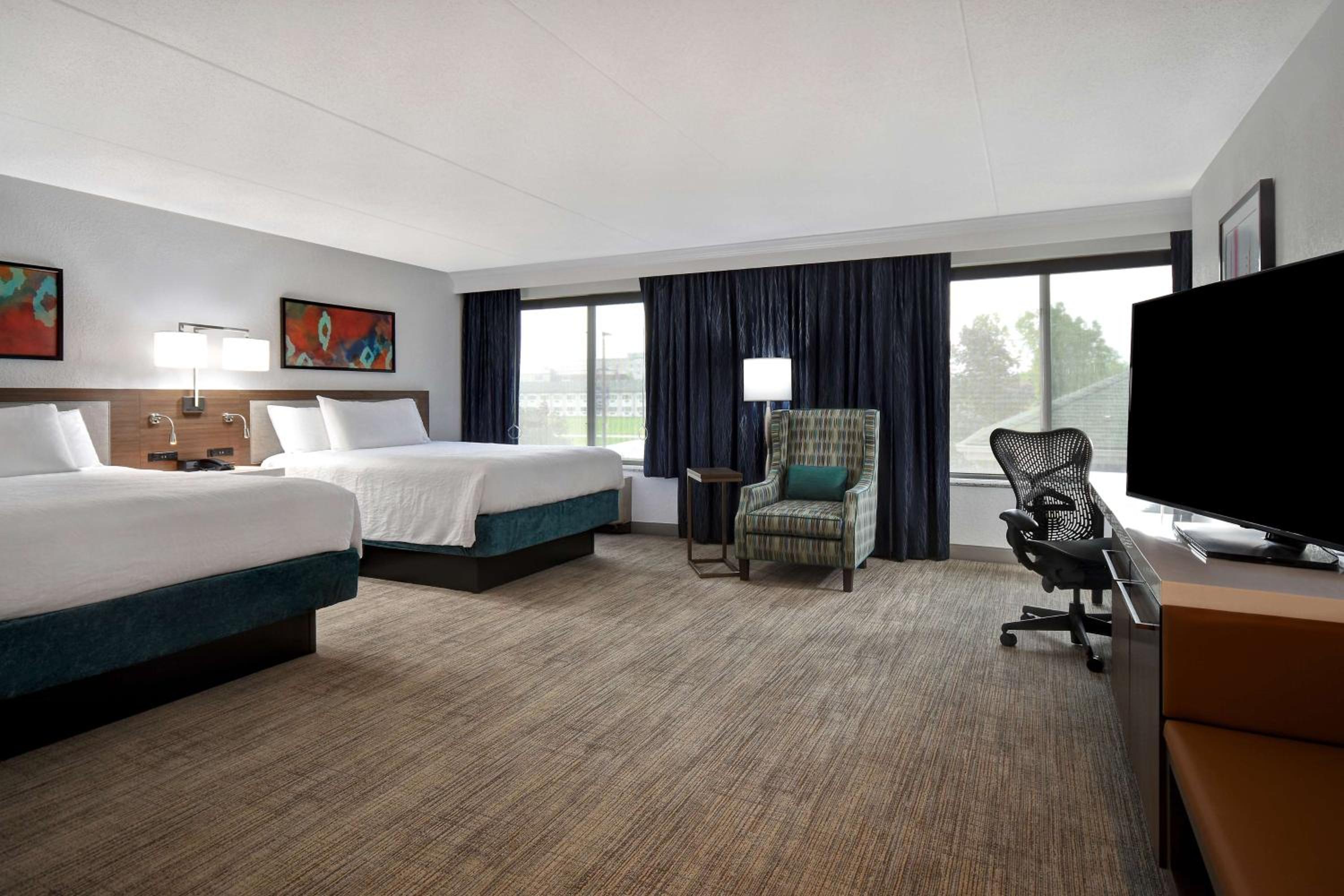 Queen Room with Two Queen Beds and Accessible Tub - Mobility Access at Hilton Garden Inn Detroit Metro Airport in Romulus