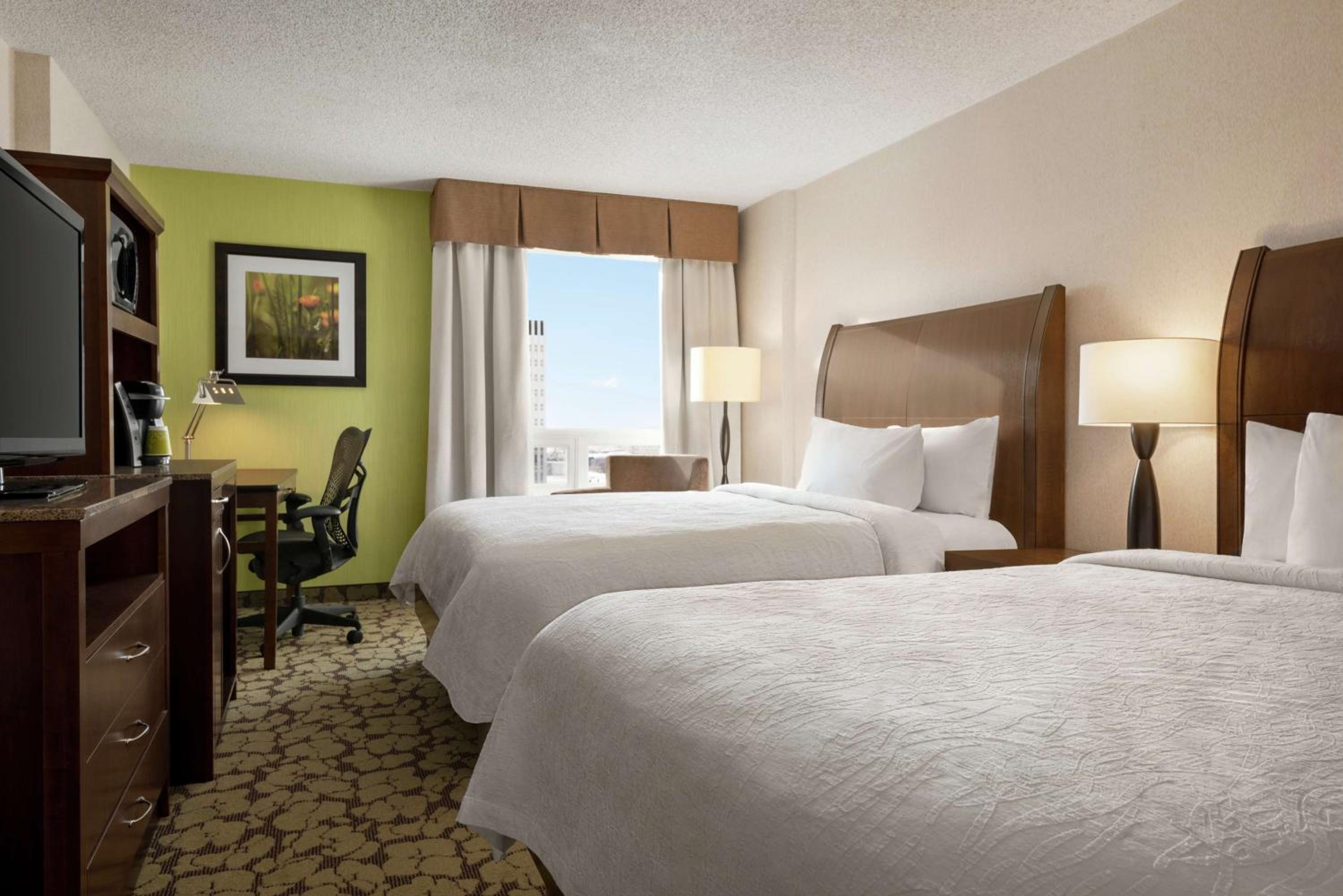 Queen Room with Two Queen Beds - Upper Floor City View - Photo 1