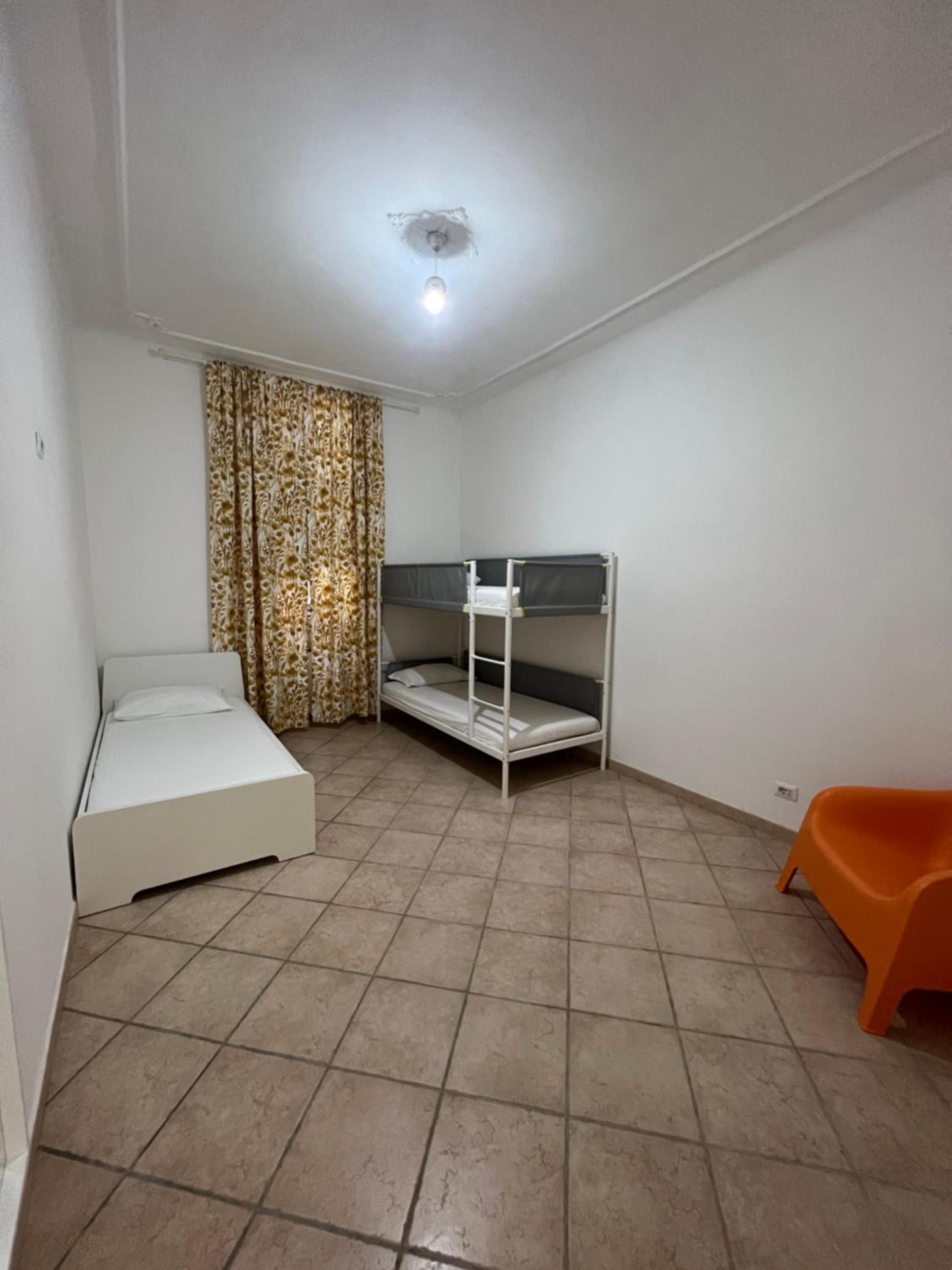 Single Bed in Female Dormitory Room