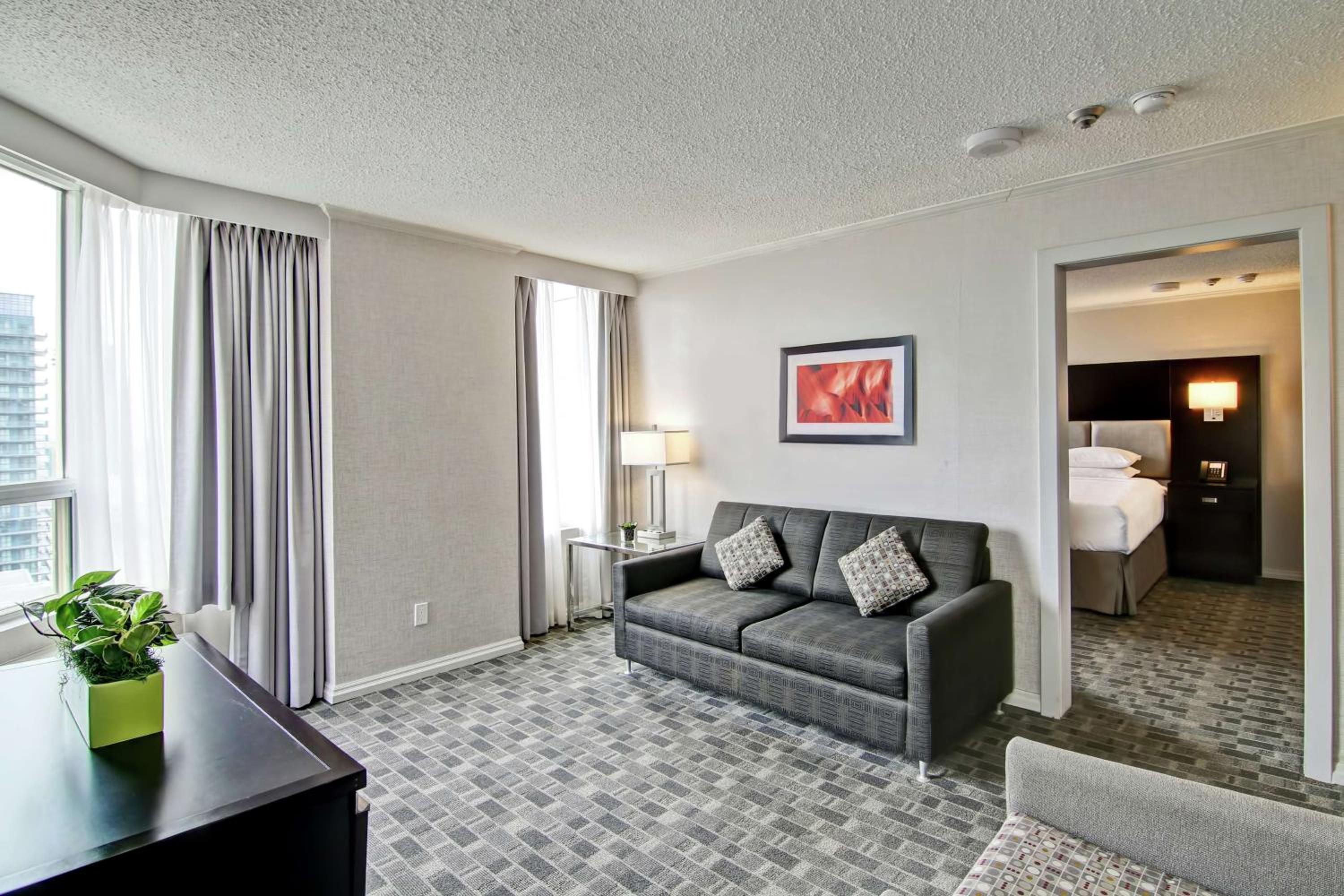 Deluxe King Suite with Sofa Bed - Photo 2
