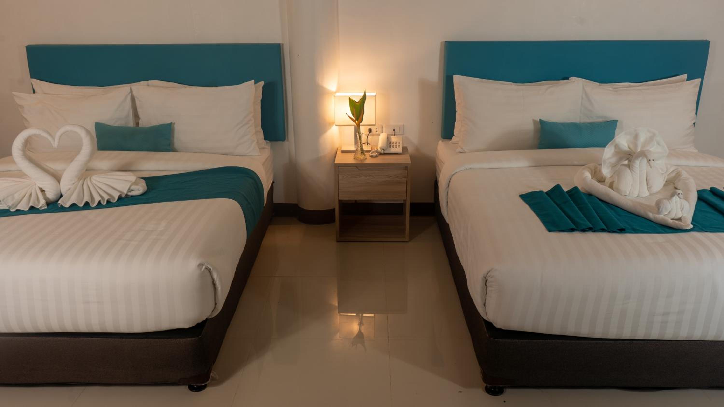 Premium Quadruple Room - Photo 18