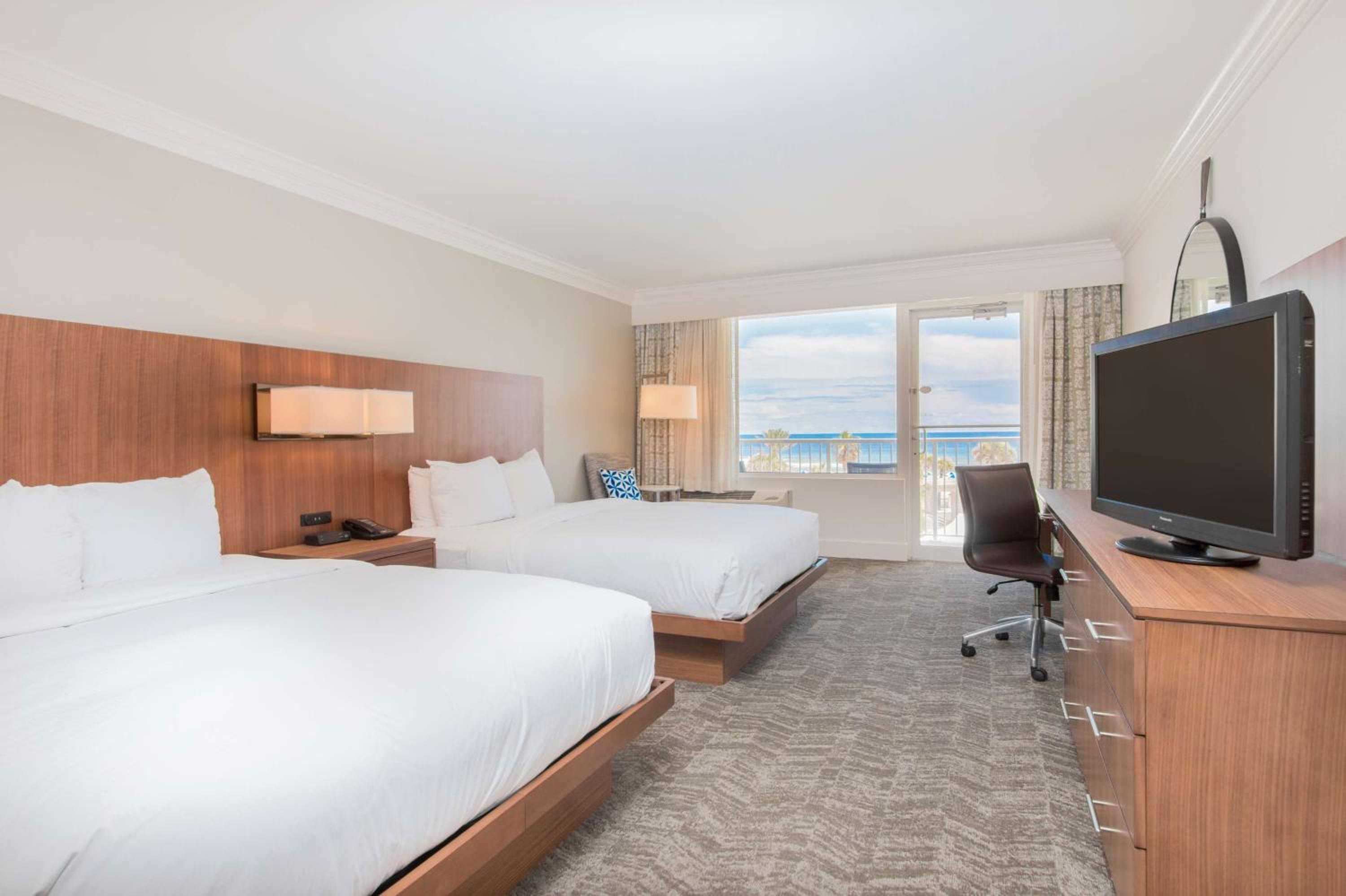Deluxe Queen Room with Two Queen Beds - Photo 1