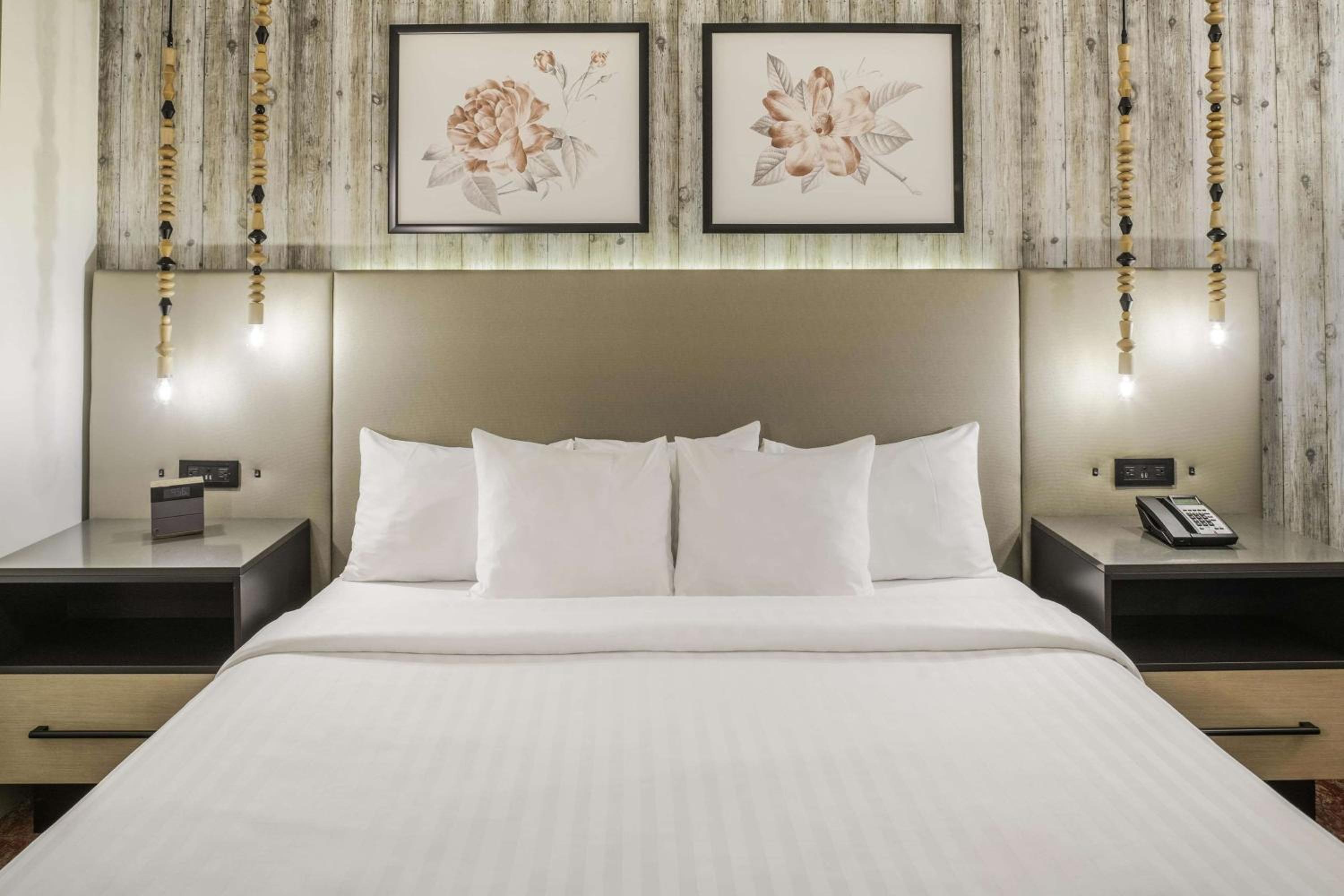 Two-Bedroom Suite with One King Bed, Two Queen Beds and Tub - Mobility and Hearing Accessible - Photo 1