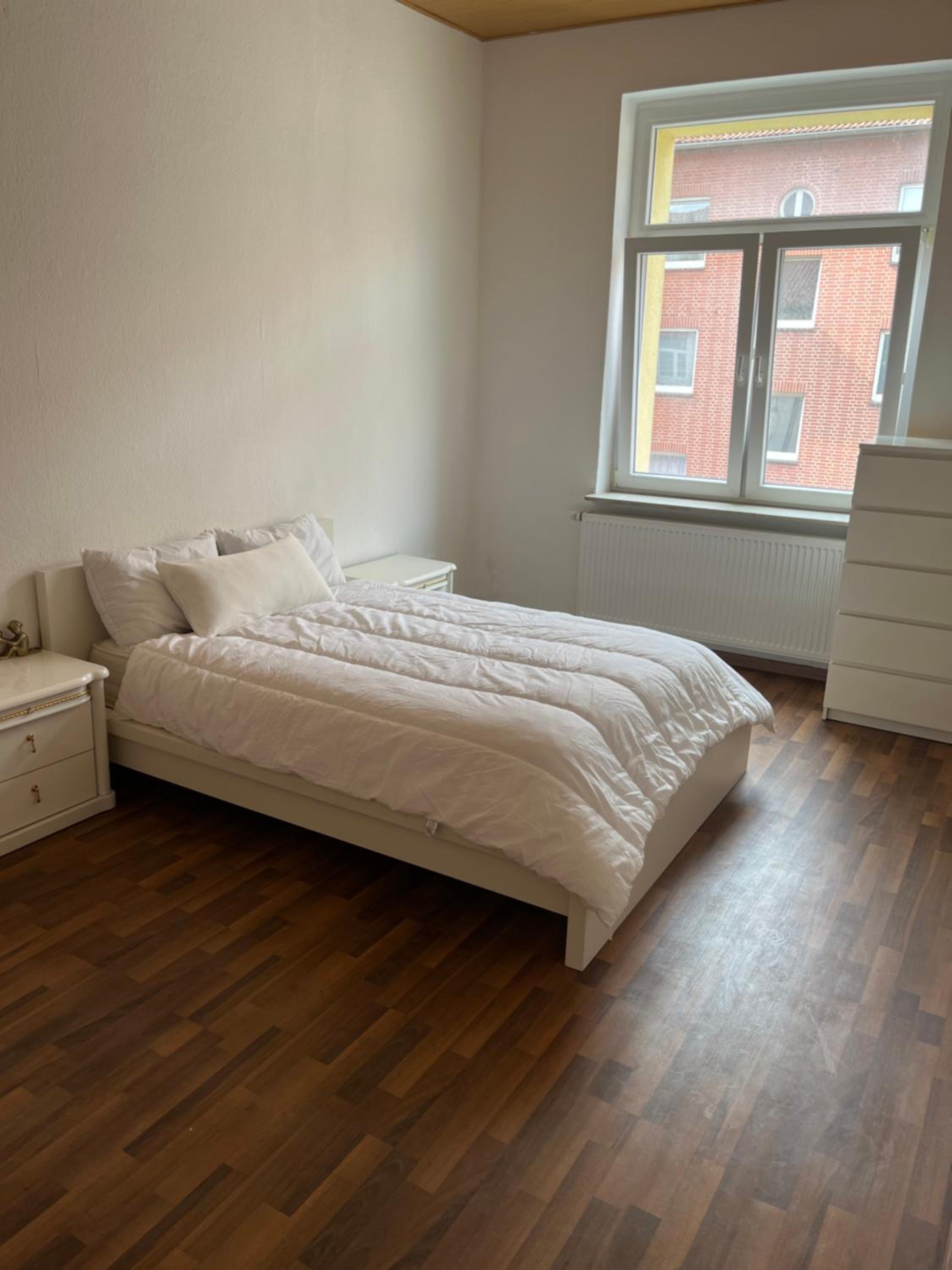Three-Bedroom Apartment photo 1