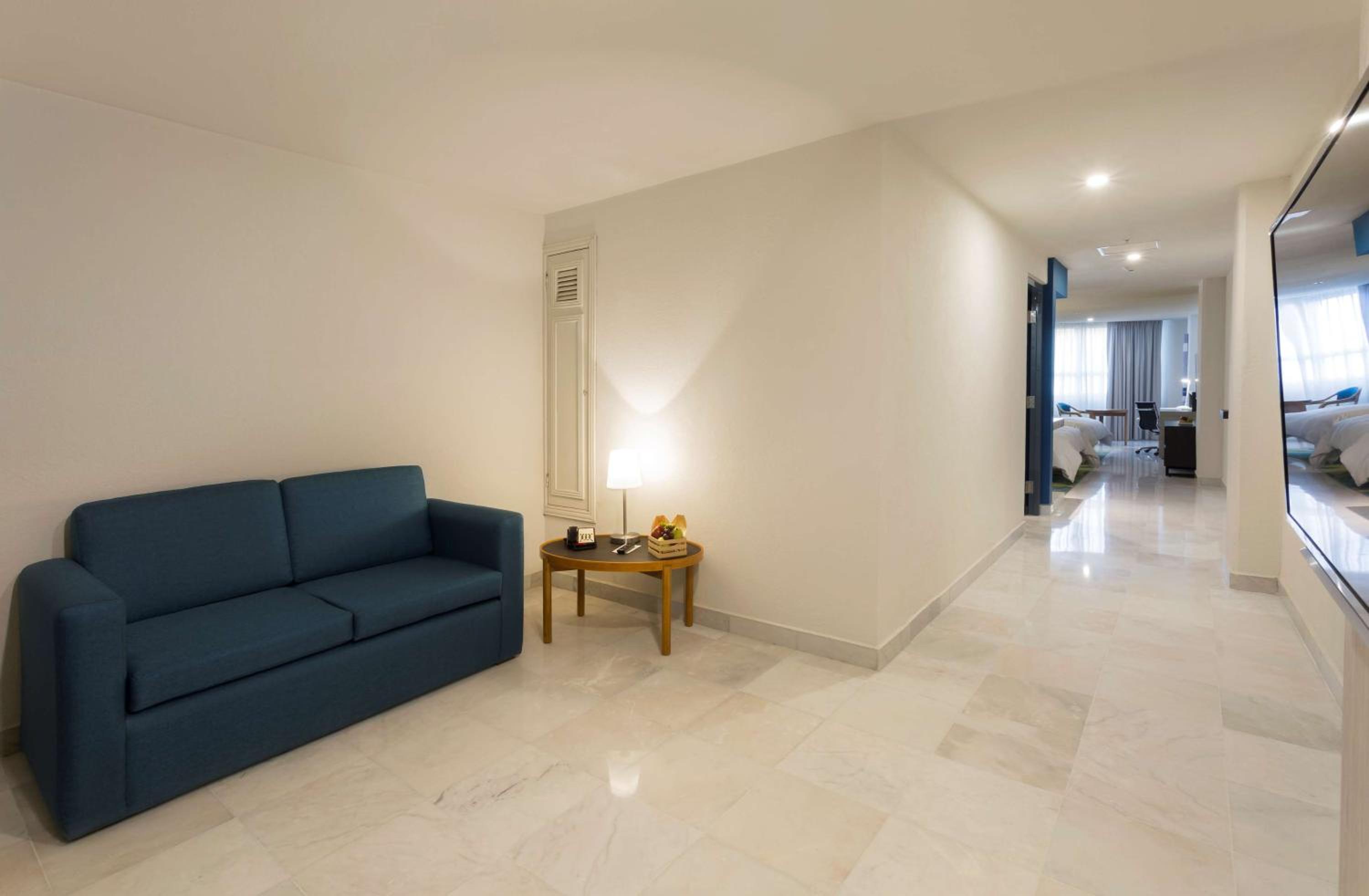 One-Bedroom Queen Suite with Two Queen Beds and Beach View