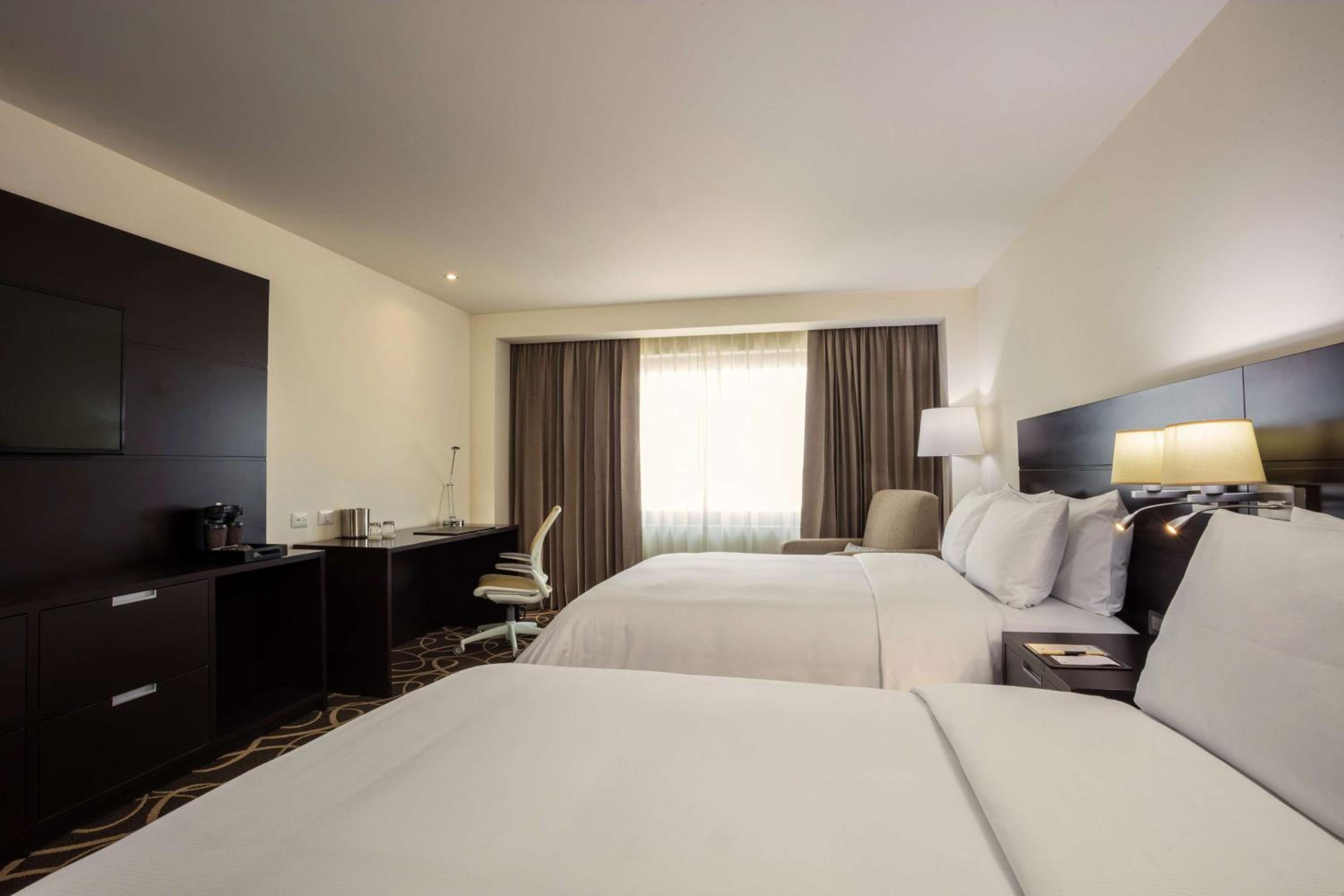 Queen Room with Two Queen Beds - Photo 1