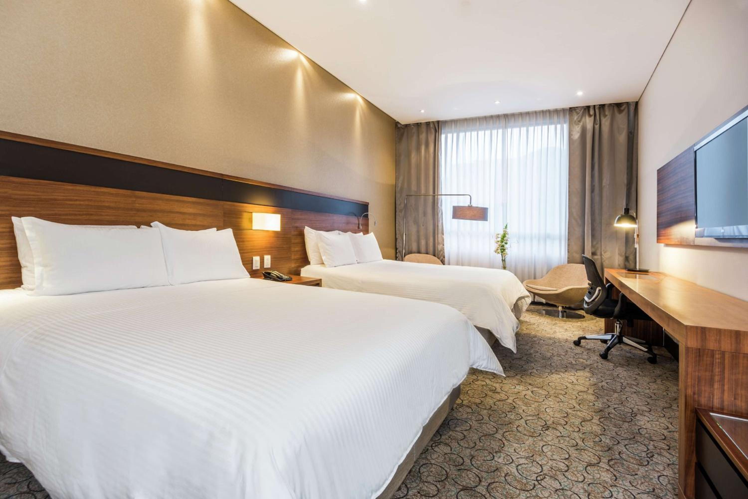 Queen Room with Two Queen Beds - Photo 1