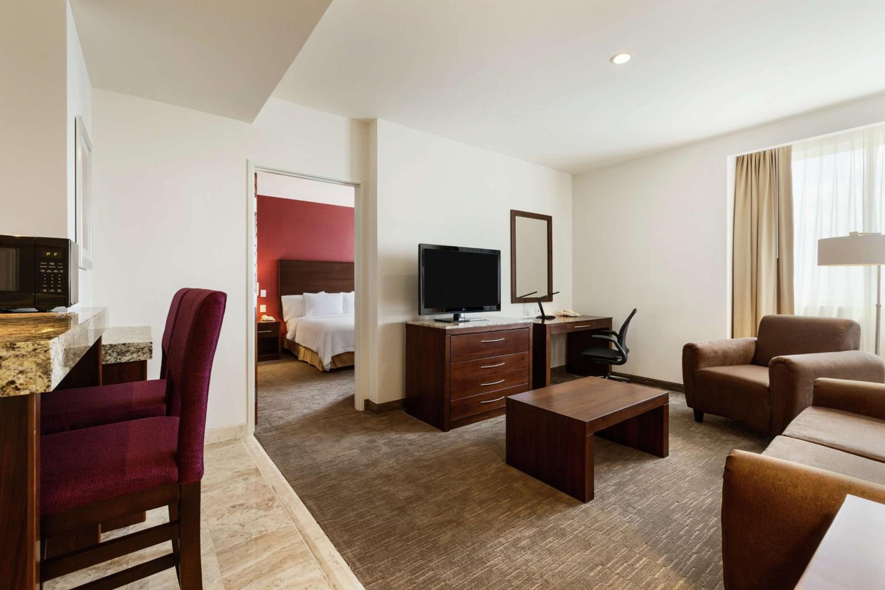 One-Bedroom King Suite with Sofa Bed photo 1