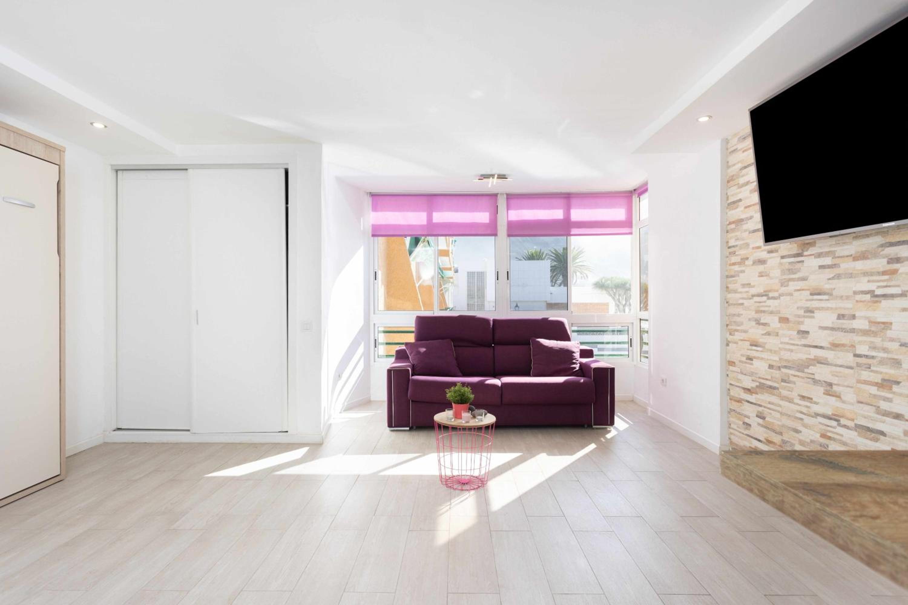 Estudio King con Sofá Cama